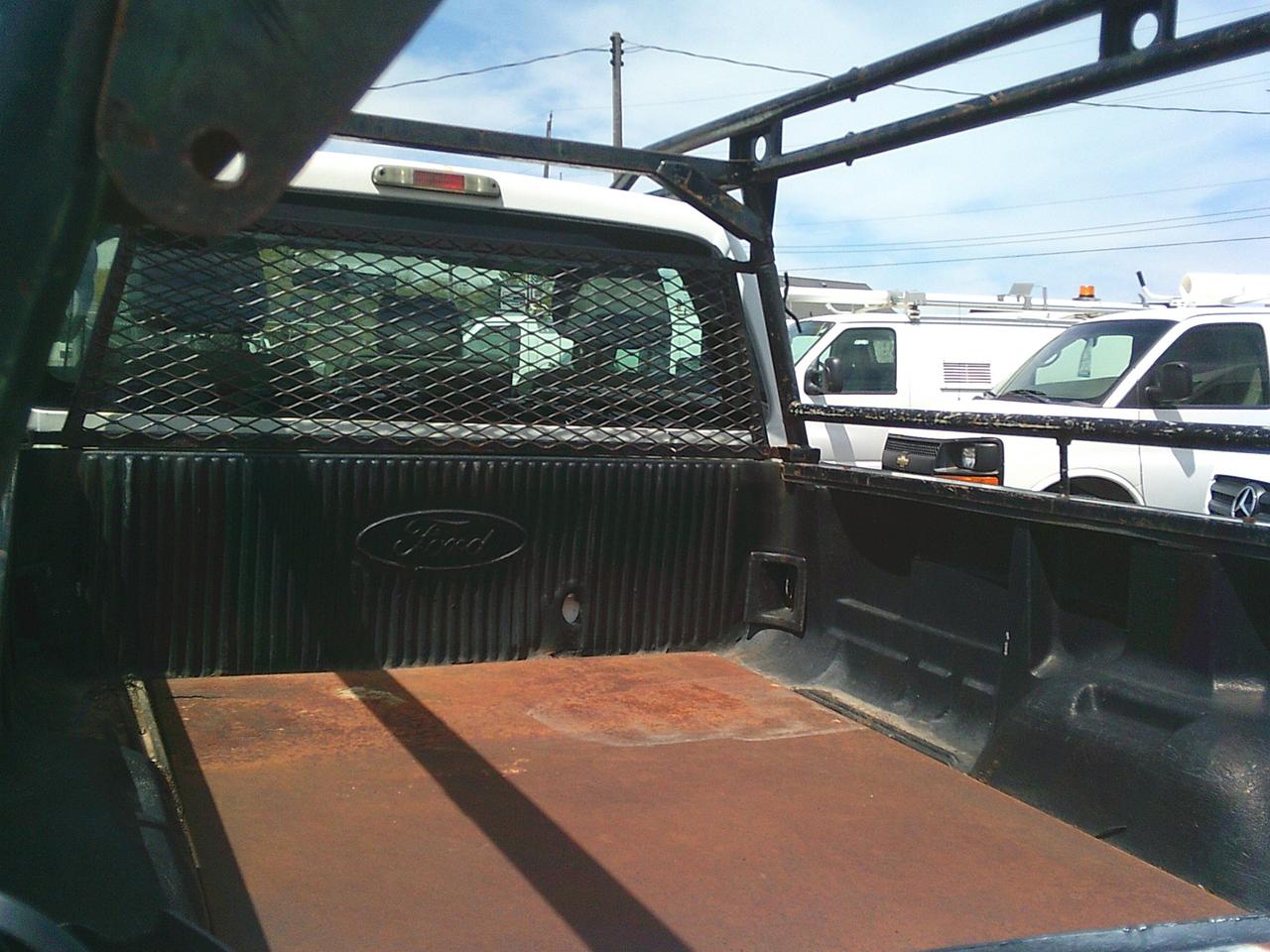 2012 Ford F-250 2WD Reg Cab 137 XL Snow Plow Photo