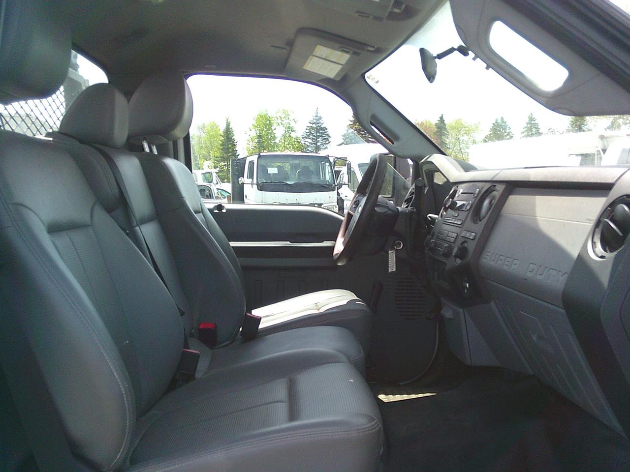 2012 Ford F-250 2WD Reg Cab 137 XL Snow Plow Photo