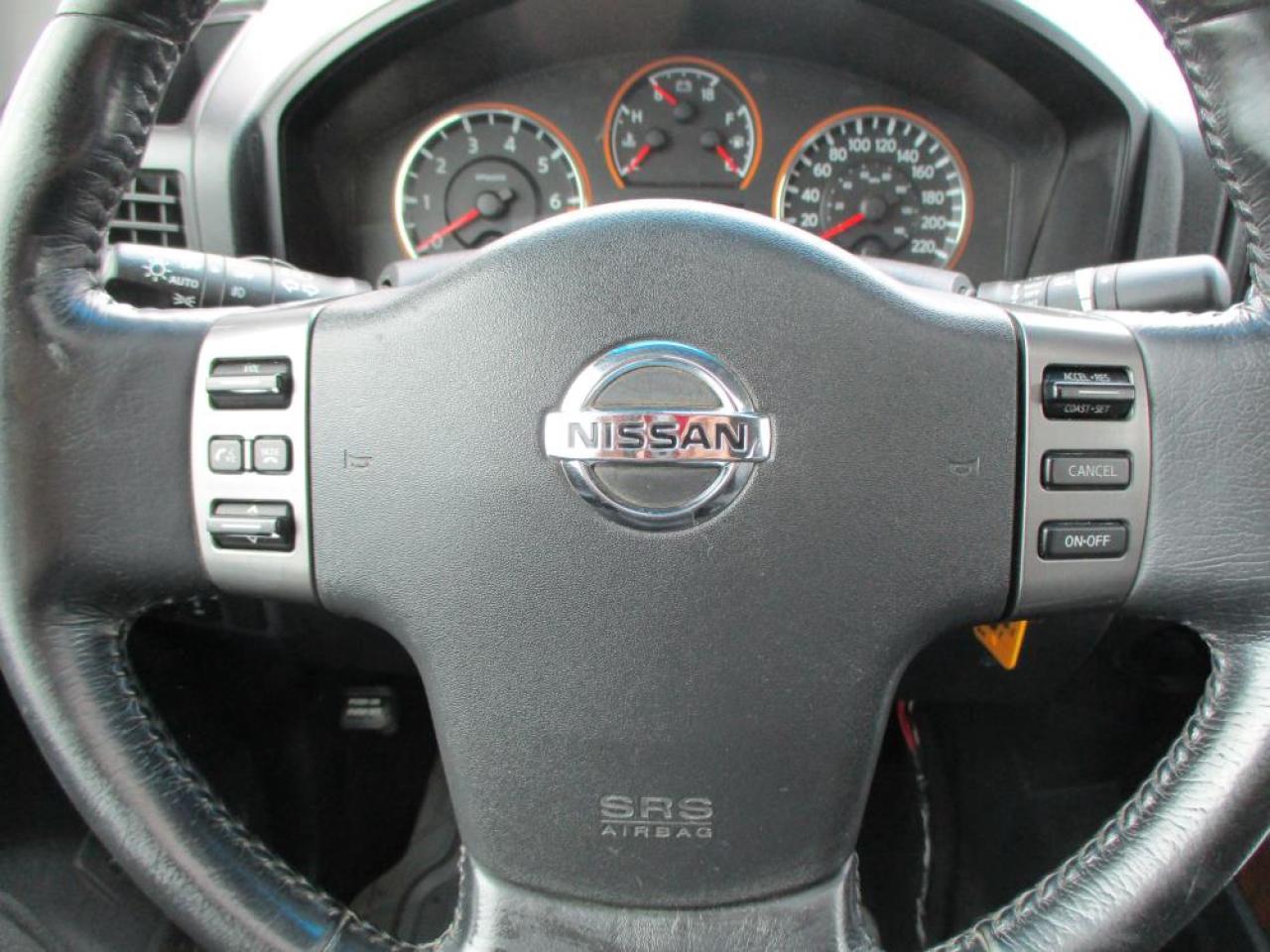 2009 Nissan Titan LE Crew Cab 4x4 - Photo #15