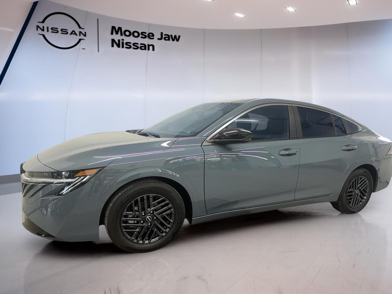 Experience the future of driving with the brand new 2026 Nissan Sentra SV, now available at Moose Jaw Nissan. This sedan stands out with its Atlantic Grey Pearl exterior and sleek black interior, offering a modern and refined presence. Equipped with a 2.0L DOHC 16-valve 4-cylinder engine and Xtronic Continuously Variable Transmission, it delivers a smooth and efficient drive every time. The Sentra SV is engineered for comfort, convenience, and advanced safety, making it the ideal choice for drivers seeking reliability and style in Moose Jaw.

ADVANCED SAFETY FEATURES  
»» Backup camera for safer parking  
»» Side impact airbags for added protection  
»» Traction control for stable handling  
»» Anti-lock braking system for secure stops  

PERFORMANCE AND EFFICIENCY  
»» 2.0L DOHC 16V 4-cylinder engine  
»» Xtronic Continuously Variable Transmission  
»» Front-wheel drive for confident traction  
»» Remote engine start for convenience  

COMFORT AND CONVENIENCE  
»» Spacious seating for five passengers  
»» Air conditioning for year-round comfort  
»» Power windows for effortless control  
»» Keyless entry for easy access  

TECHNOLOGY AND CONNECTIVITY  
»» Bluetooth hands-free phone system  
»» USB port for device charging  
»» Touchscreen display for easy navigation  
»» Steering wheel audio controls  

CARGO SPACE  
»» Large trunk for daily essentials  
»» Split-folding rear seats for flexibility  
»» Wide opening for easy loading  
»» Ample storage for travel needs  

WHAT OTHER OWNERS LIKE  
»» Smooth and quiet ride quality  
»» User-friendly infotainment system  
»» Excellent fuel efficiency  
»» Comfortable and spacious interior  

This 2026 Nissan Sentra SVs VIN is: 3N1AB9CV8TY209543.