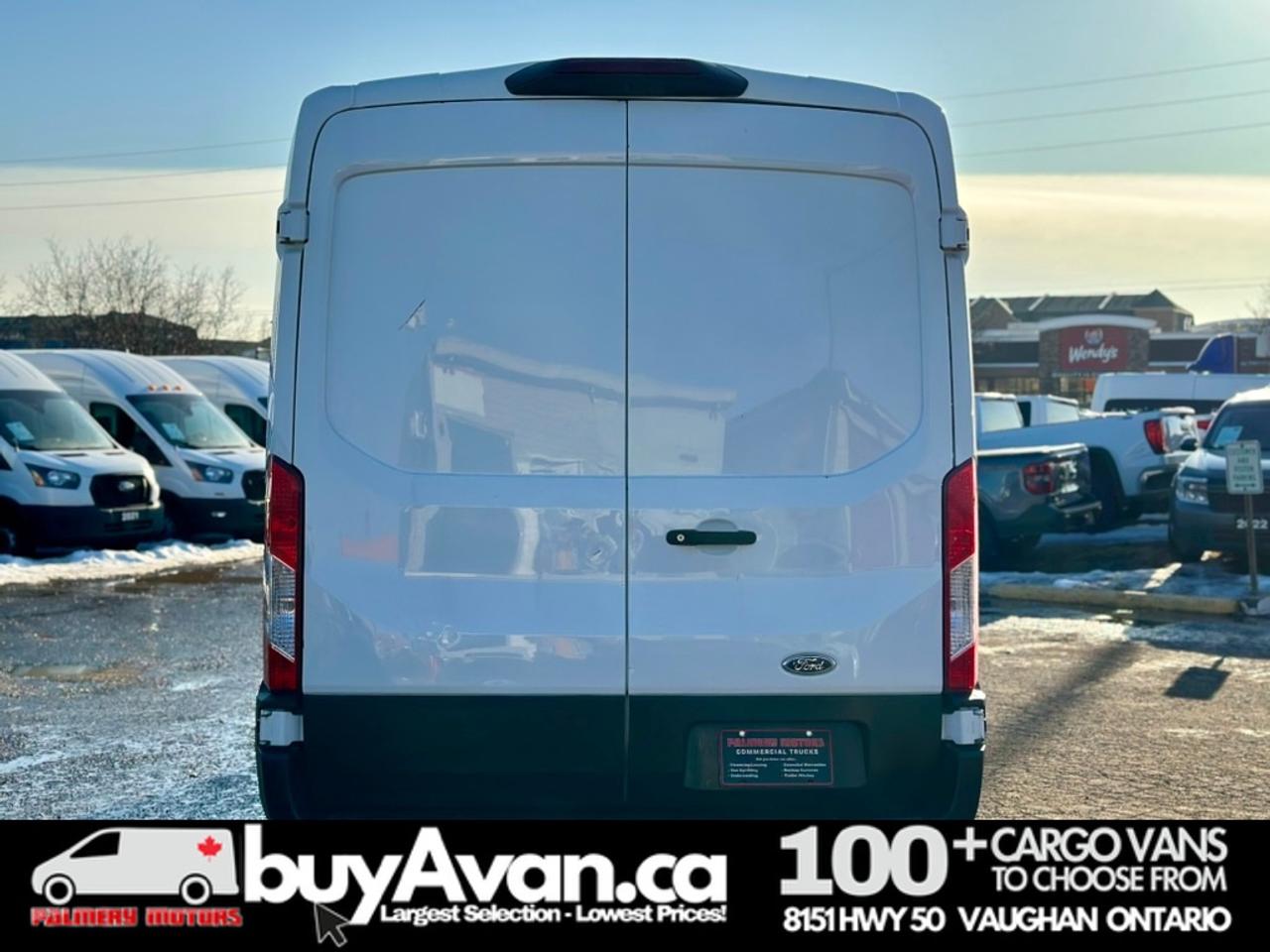 2021 Ford Transit Cargo Van Cargo 148 WB Mid Roof + Divider   CERTIFIED Photo