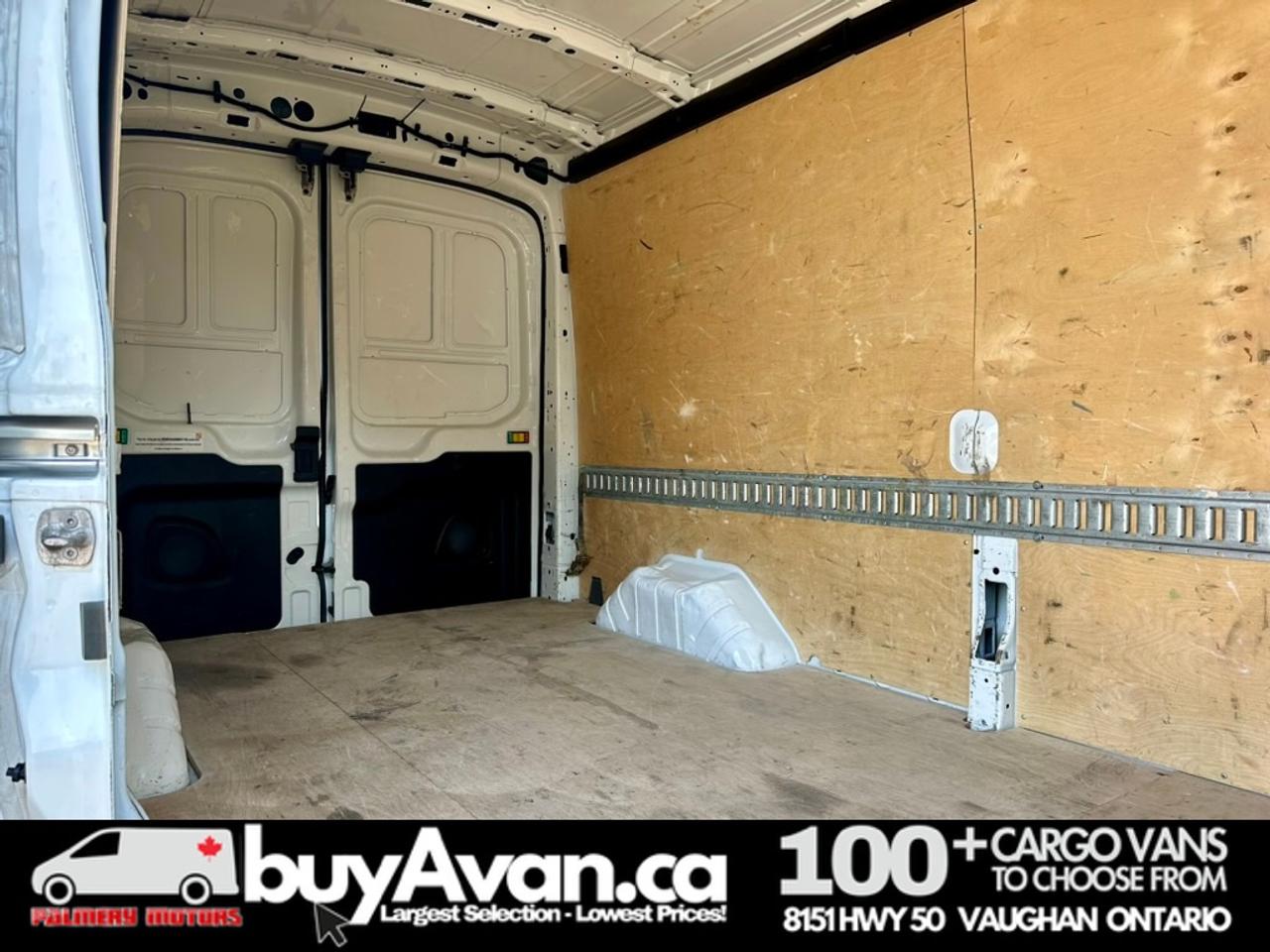 2021 Ford Transit Cargo Van Cargo 148 WB Mid Roof + Divider   CERTIFIED Photo