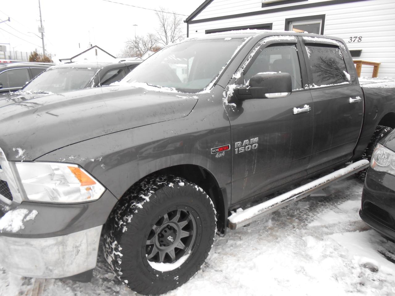 2014 RAM 1500 4WD Crew Cab 140.5  SLT ECO DIESEL SAFETY INCLUDED Photo