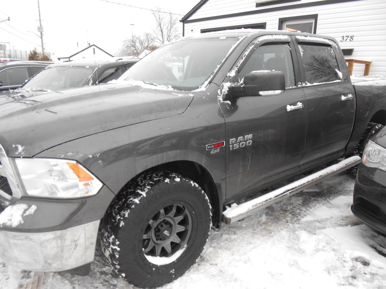 2014 RAM 1500 4WD Crew Cab 140.5  SLT ECO DIESEL SAFETY INCLUDED Photo