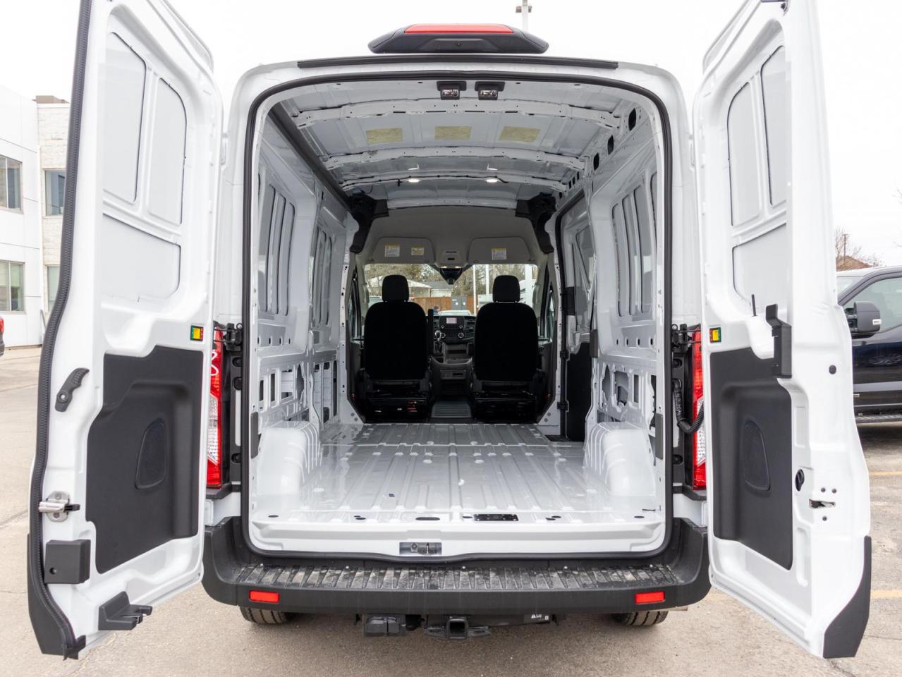 2025 Ford Transit-150 Cargo Base All-Wheel Drive Medium Roof Van 148 in. WB Photo