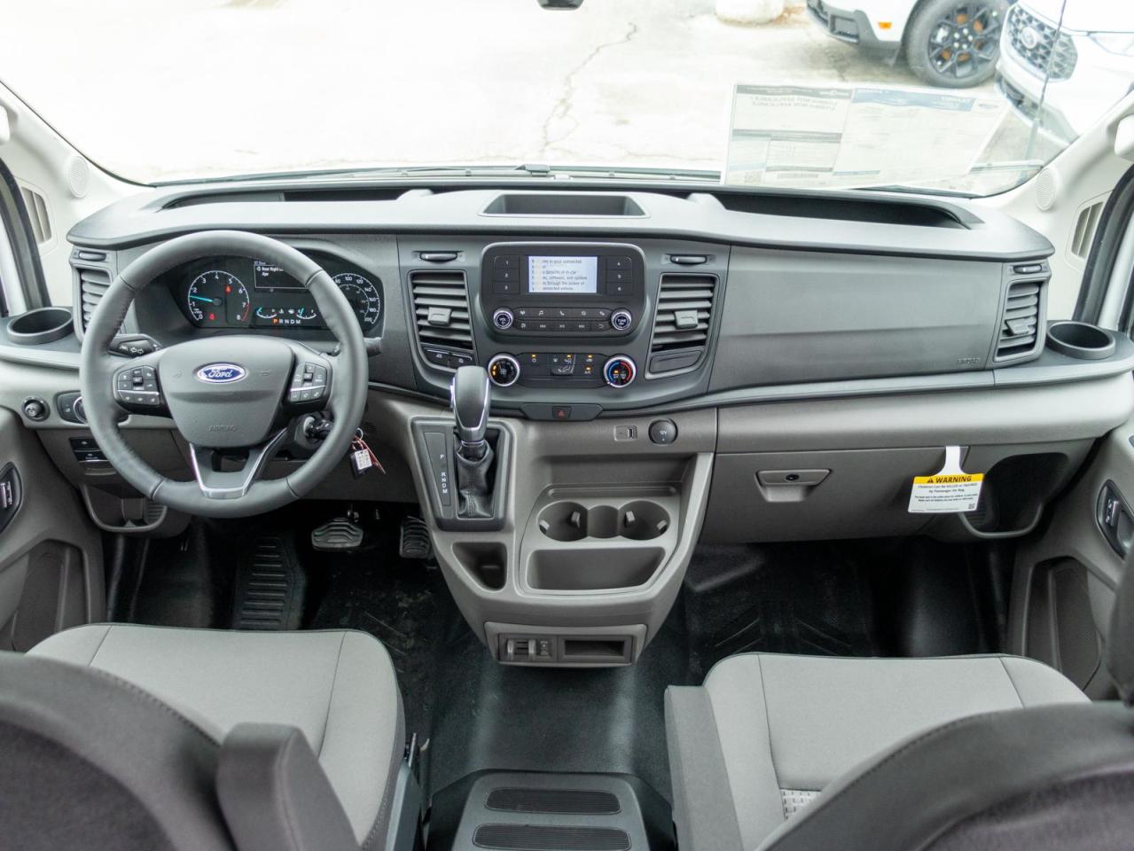 2025 Ford Transit-150 Cargo Base All-Wheel Drive Medium Roof Van 148 in. WB Photo