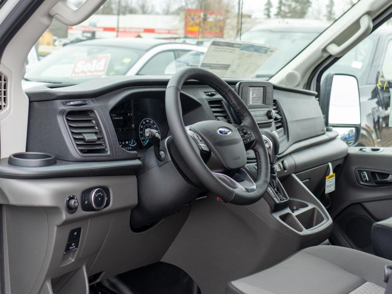 2025 Ford Transit-150 Cargo Base All-Wheel Drive Medium Roof Van 148 in. WB Photo