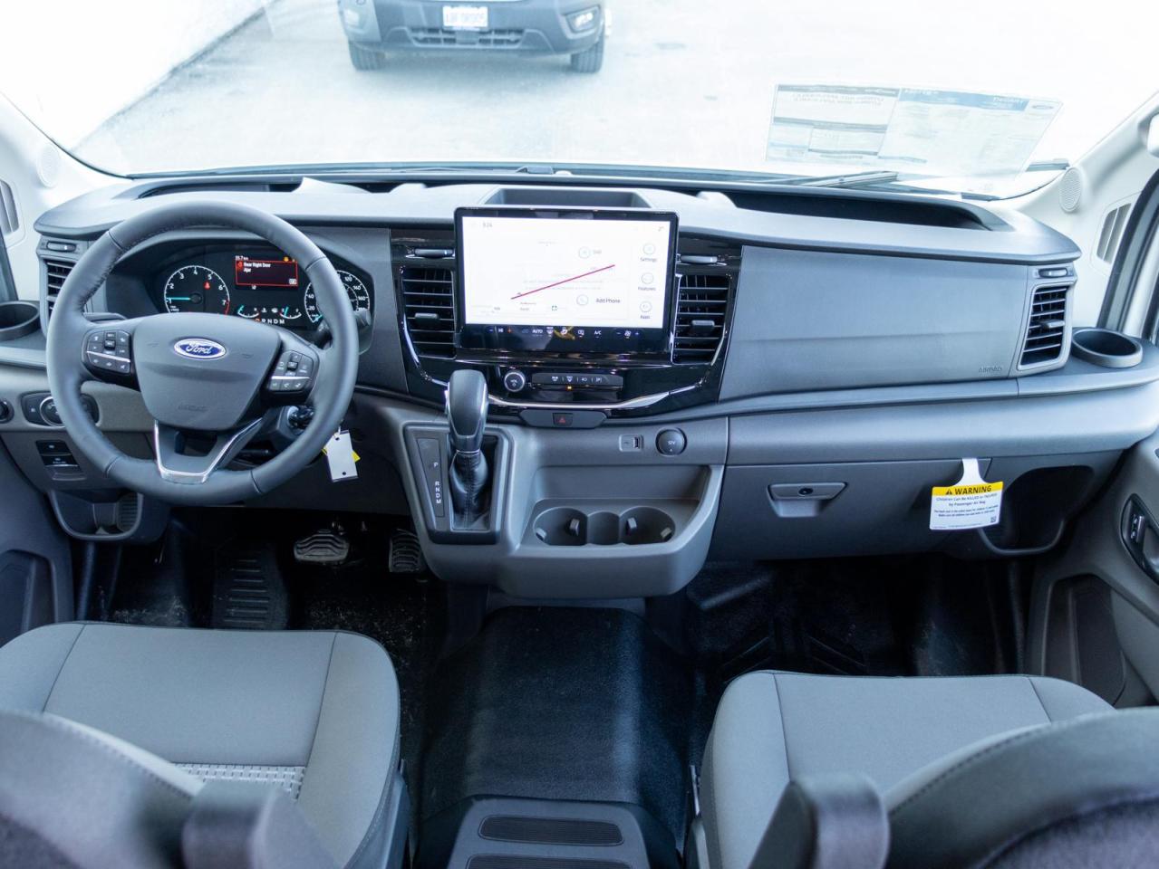 2024 Ford Transit-150 Cargo Base All-Wheel Drive Medium Roof Van 148 in. WB Photo