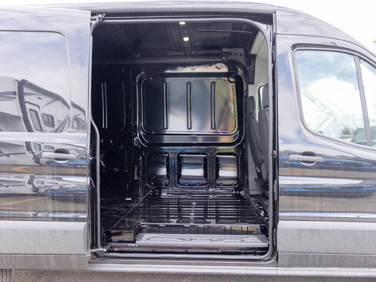 2025 Ford Transit-150 Cargo Base All-Wheel Drive Medium Roof Van 148 in. WB Photo