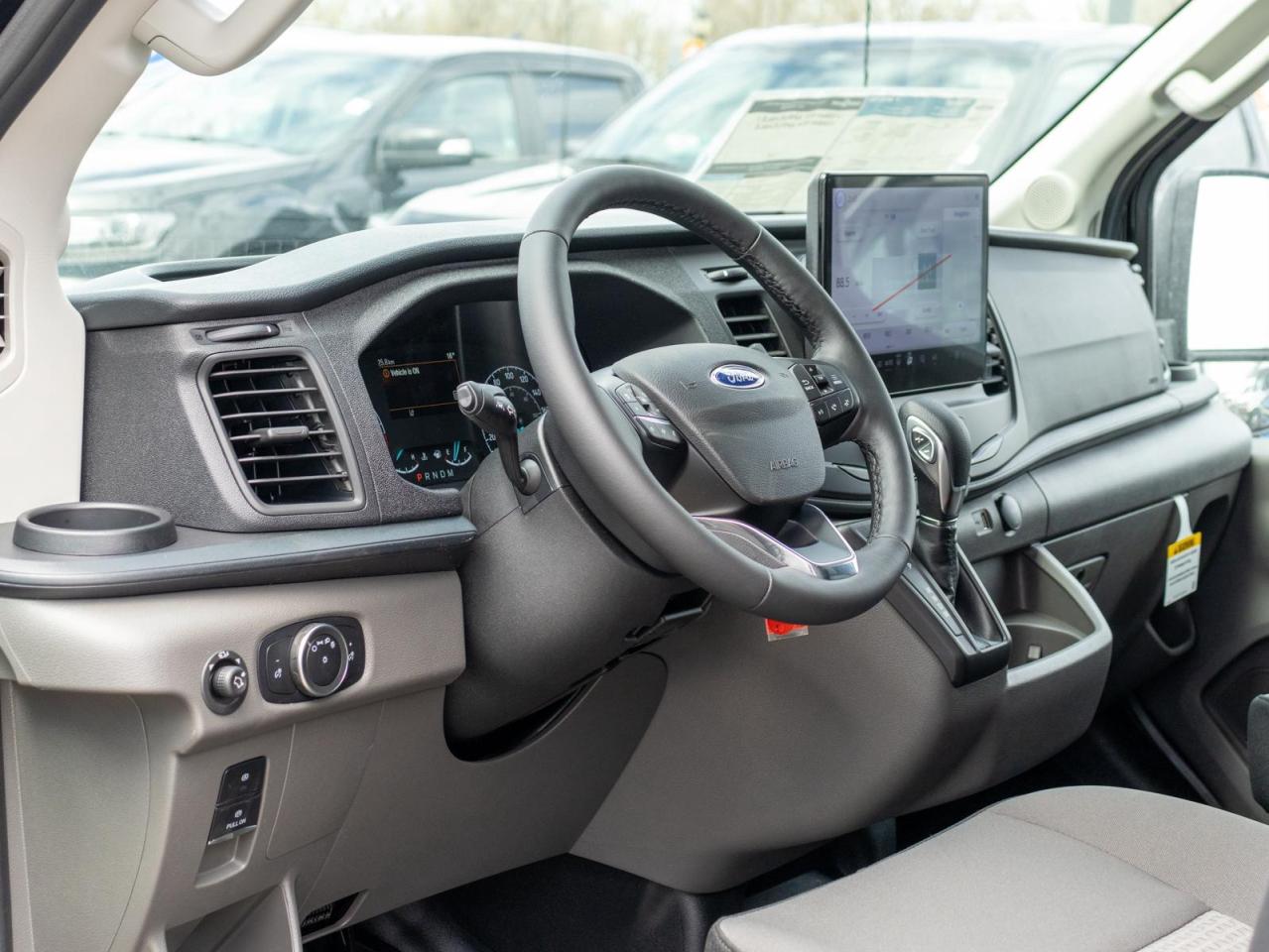 2025 Ford Transit-150 Cargo Base All-Wheel Drive Medium Roof Van 148 in. WB Photo