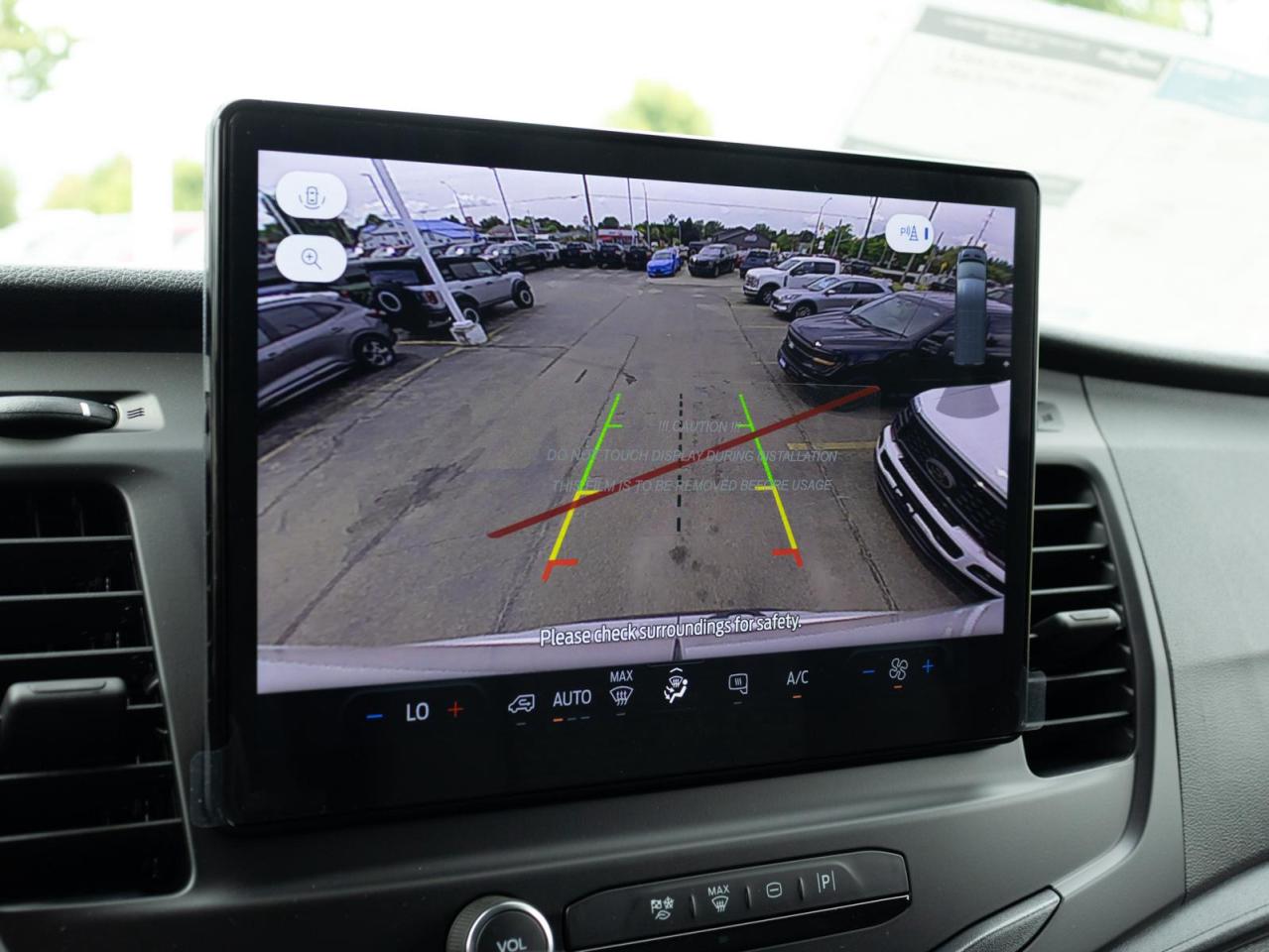 2025 Ford Transit-150 Cargo Base All-Wheel Drive Medium Roof Van 148 in. WB Photo