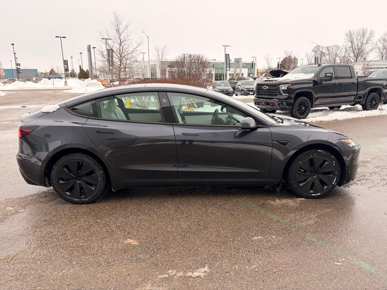 2024 Tesla Model 3 Base 4dr Rear-Wheel Drive Sedan Photo3