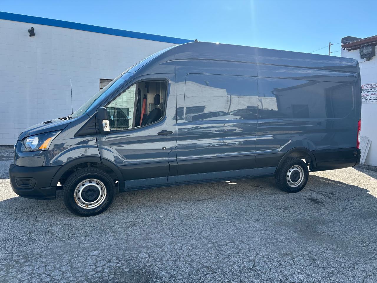 2021 Ford Transit Cargo Van T-250 148" EL Hi Rf 9070 GVWR RWD - Photo #2