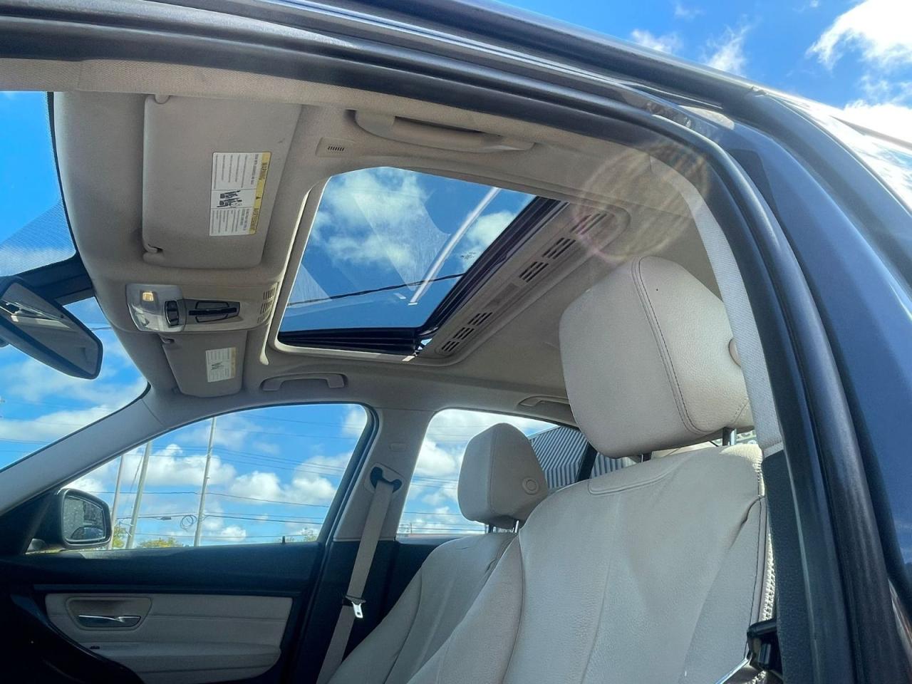 2013 BMW 3 Series 320i AWD LOW KM SAFETY INCLUDED NEW Tires + Brake Photo