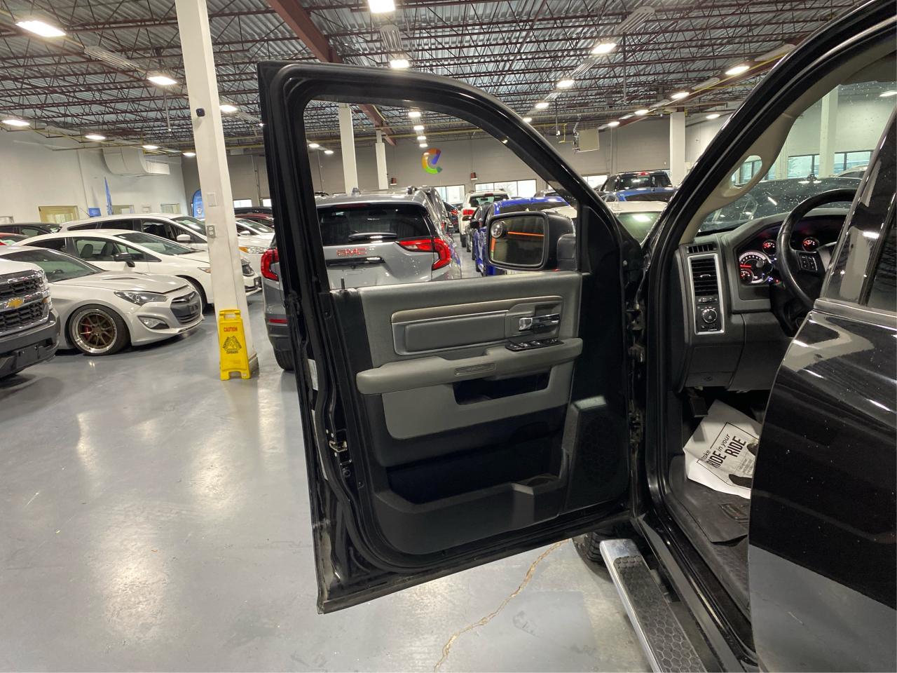 2015 RAM 1500 4WD QUAD CAB 140.5" BIG HORN 5.7L HEMI Photo