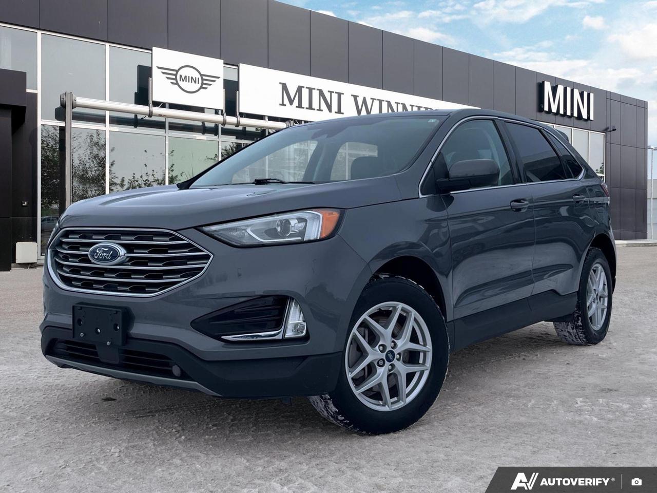 Local Vehicle!
Good Condition!
Discover the perfect blend of comfort and capability with this 2021 Ford Edge SEL. Featuring a powerful 2.0L 4-cylinder engine and All-Wheel Drive, this SUV is ready for any adventure.

Highlights:
- Panoramic Vista Roof for an open, airy cabin experience
- Ford Co-Pilot360 Assist+ for enhanced safety and driver assistance
- Convenient power liftgate for easy cargo access
- Leather seating for a touch of luxury
- New tires and brakes for peace of mind
- Class II Trailer Tow Package for added versatility
- Cold Weather Package for those chilly mornings

Experience the Ford Edge for yourself at MINI Winnipeg. Whether youre ready to start your purchase journey or have questions, our team is here to assist. Book a test drive today and feel the difference behind the wheel of this exceptional SUV. Visit our website at www.birchwoodbmw.ca to explore financing options or to reserve your Edge now.
Unforgettable experiences guaranteed! Buy your next Pre-Owned vehicle from Birchwood BMW and enjoy brand specific luxuries including:
 A full CARFAX vehicle report
 Complete vehicle detailing & a full tank of gas.
 BMW Factory Certified Technicians with 100+ Years of Experience
 Certifiable BMW Vehicles
 21 Loaner Vehicles
Discover the ultimate driving experience today! Book your appointment at 204-452-7799.
Dealer Permit #9740
Dealer permit #9740
