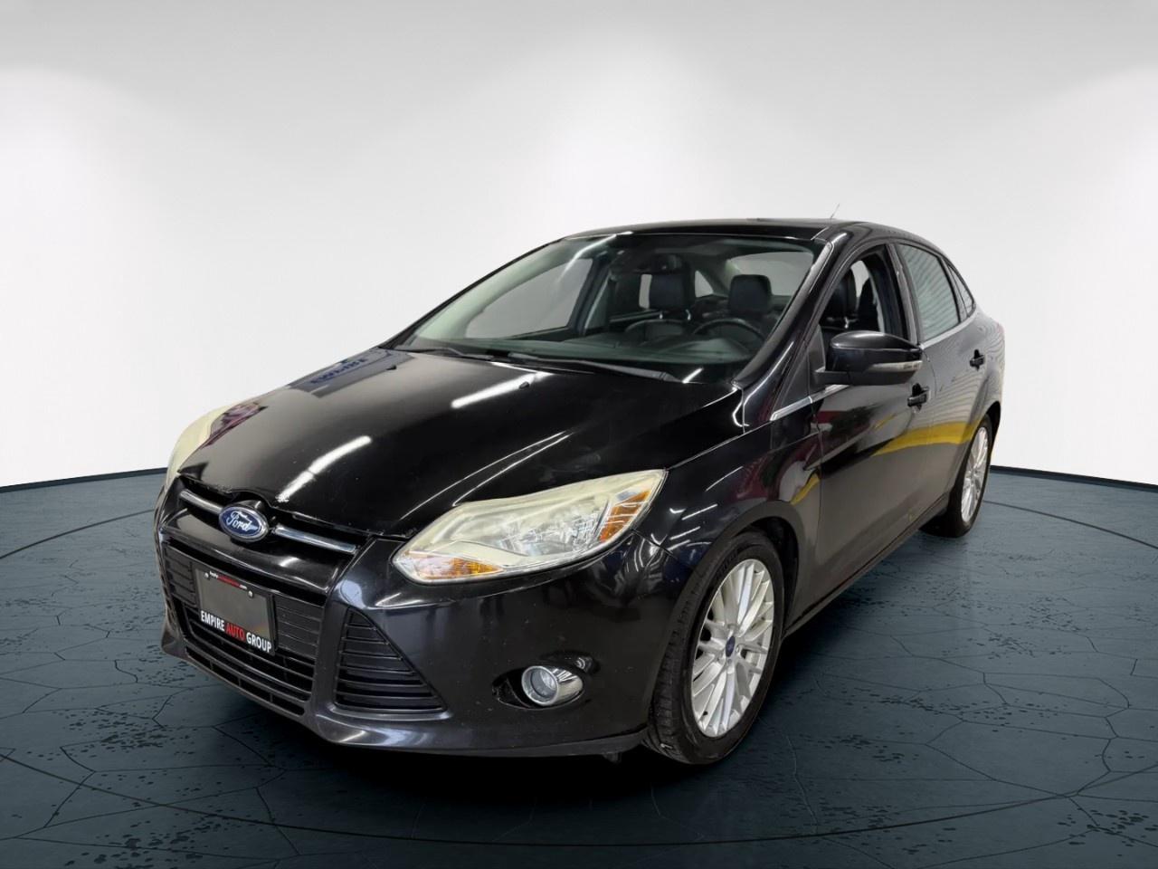 <a href=https://autoapprovers.com/?source_id=2 target=_blank>Apply for financing</a>

<p>Experience the 2012 Ford Focus SEL, a sophisticated sedan in stunning black with a responsive front-wheel-drive system for optimal handling. The Focus combines style and grace, offering a dynamic drive in both city streets and open roads.</p><p>The sleek exterior of the Focus is accented by modern alloy wheels, ensuring you make a statement wherever you drive. Inside, indulge in the stylish interior that features a leather steering wheel and the comfort of heated front seats, providing a cozy drive during those chilly Canadian winters.</p><p>Equipped with cutting-edge technology, this Focus includes a Bluetooth connection for seamless hands-free communication and a range of safety enhancements like brake assist, which are designed to offer you peace of mind on every journey. The vehicle also provides convenient options such as keyless entry, power windows, and cruise control, elevating your driving experience.</p><p>This Ford Focus SEL is perfect for those seeking practicality combined with flair, offering great value to both the daily commuter and the road trip enthusiast. Contact us today to learn more about how this remarkable sedan can fit into your lifestyle.</p><p>All our certified cars comes with 250 point inspection. 0 Down Payment Options Available. Whether its excellent, good, bad, no credit, collections, a discharged bankruptcy or proposal, even if your still in bankruptcy or proposal, have fines or parking tickets including 407 ETR fines, been divorced, young and no one will give you a shot, new to the country, have a fixed income or are currently self-employed, if you have the income we have the lenders that can get it done, you name it, there are lenders out there that will finance you!</p>                         <p><b>ALL CREDIT SITUATIONS ACCEPTED! Dont hesitate&nbsp;<a class=redborder href=apply.php target=_blank rel=noopener>APPLY NOW!</a></b></p>                         <p>*All payments shown are based on a 4.95%. Rate of borrowing a vehicle over qualified term based on the lender. Example: The cost of borrowing on a vehicle, at the purchase price of $10,000, at 4.95% rate of borrowing over 60 month term would be $43.45+HST weekly. Rates are subject to change without notice. Payments are available on approved credit. <b>Best Interest Rate</b>&nbsp;for your car loan Guaranteed!&nbsp;<i>Vehicle being presented might not be financeable; payments are available on approved credit.</i></p>                         <p><b>* All prices exclude HST and Licensing.&nbsp;</b><b>*At times, a down payment may be required for financing however we will do our best to achieve a $0 down payment.</b></p>                         <p><b>* Guaranteed Savings ask one of our representatives for details all in pricing with only HST extra and discounts offered on our vehicles and warranties. *Financing does NOT apply for As-Is vehicles.</b></p>                         <p><b>* As per OMVIC regulations&comma; this vehicle is not road worthy,  not safety certified and not licensed. Certification is available for $799. All our vehicles are in excellent condition and have been fully inspected by an in-house licensed mechanic. Each Empire Auto Group client is a satisfied guest, GUARANTEED!</b></p>                         <p>* Empire Auto Group shall not be held liable for any errors or omissions pertaining to information provided (whether orally, in writing, or in digital image form) on this website, included but not limited to: year, make, model, vehicle options (both hardware and software), vehicle condition, vehicle trim, accessories, mileage. Client is solely responsible for performing appropriate due diligence as it pertains to any and all information regarding the type, condition, options, vehicle trim, status, and history of vehicle before completing a transaction. The advertised price is a finance only price, if you wish to purchase the vehicle for cash additional $2,000 surcharge will apply. Applicable prices and special offers are subject to change with or without notice and shall be at the full discretion of Empire Auto Group.</p>                         <p>* Vehicle sold as seen as equipped. Cosmetic repairs & non safety items at customers cost if requested.</p>                         <p>This vehicle could be at any of our 3 locations - Empire Auto East (2293 Dundas St, London, ON) or Empire Auto West (282 Springbank Dr, London, ON) or Southdale Motors (284 Springbank Dr, London, ON). Please call us for more information.</p><br/><br/>Looking to Purchase or Finance a Ford Focus or just a Ford Sedan? We carry 100s of handpicked vehicles, with multiple Ford Sedans in stock! Visit us online at <a href=https://empireautogroup.ca/?source_id=6>www.EMPIREAUTOGROUP.CA</a> to view our full line-up of Ford Focuss or  similar Sedans. New Vehicles Arriving Daily!<br/>  	<br/>FINANCING AVAILABLE FOR THIS LIKE NEW FORD FOCUS!<br/> 	REGARDLESS OF YOUR CURRENT CREDIT SITUATION! APPLY WITH CONFIDENCE!<br/>  	SAME DAY APPROVALS! <a href=https://empireautogroup.ca/?source_id=6>www.EMPIREAUTOGROUP.CA</a> or CALL/TEXT 519.659.0888.<br/><br/>	   	THIS, LIKE NEW FORD FOCUS INCLUDES:<br/><br/>  	* Wide range of options that you will enjoy.<br/> 	* Comfortable interior seating<br/> 	* Safety Options to protect your loved ones<br/> 	* Fully Certified<br/> 	* Pre-Delivery Inspection<br/> 	* Door Step Delivery All Over Ontario<br/> 	* Empire Auto Group  Seal of Approval, for this handpicked Ford Focus<br/> 	* Finished in Black, makes this Ford look sharp<br/><br/>  	SEE MORE AT : <a href=https://empireautogroup.ca/?source_id=6>www.EMPIREAUTOGROUP.CA</a>