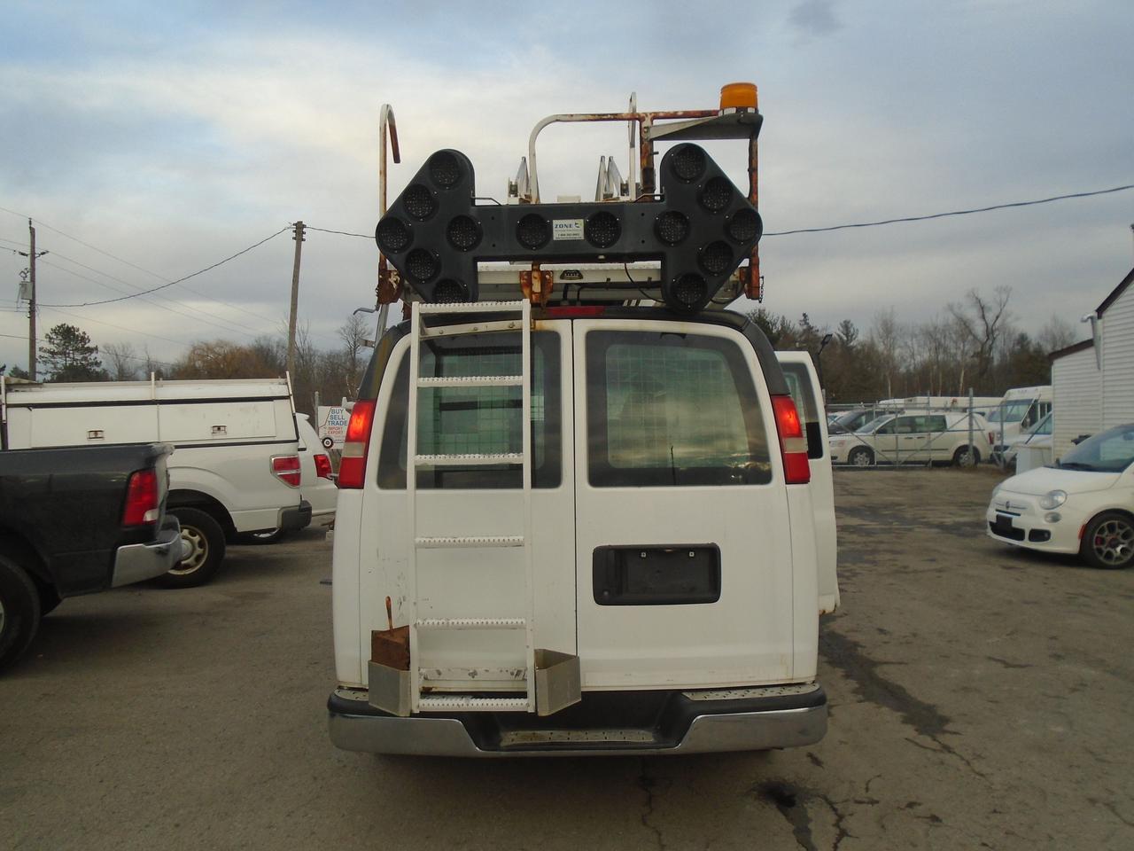 2011 Chevrolet Express Bucket Truck RWD 3500 35 Feet High Photo