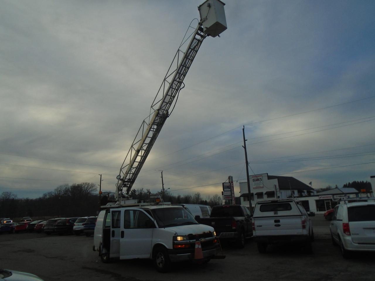 2011 Chevrolet Express Bucket Truck RWD 3500 35 Feet High Photo