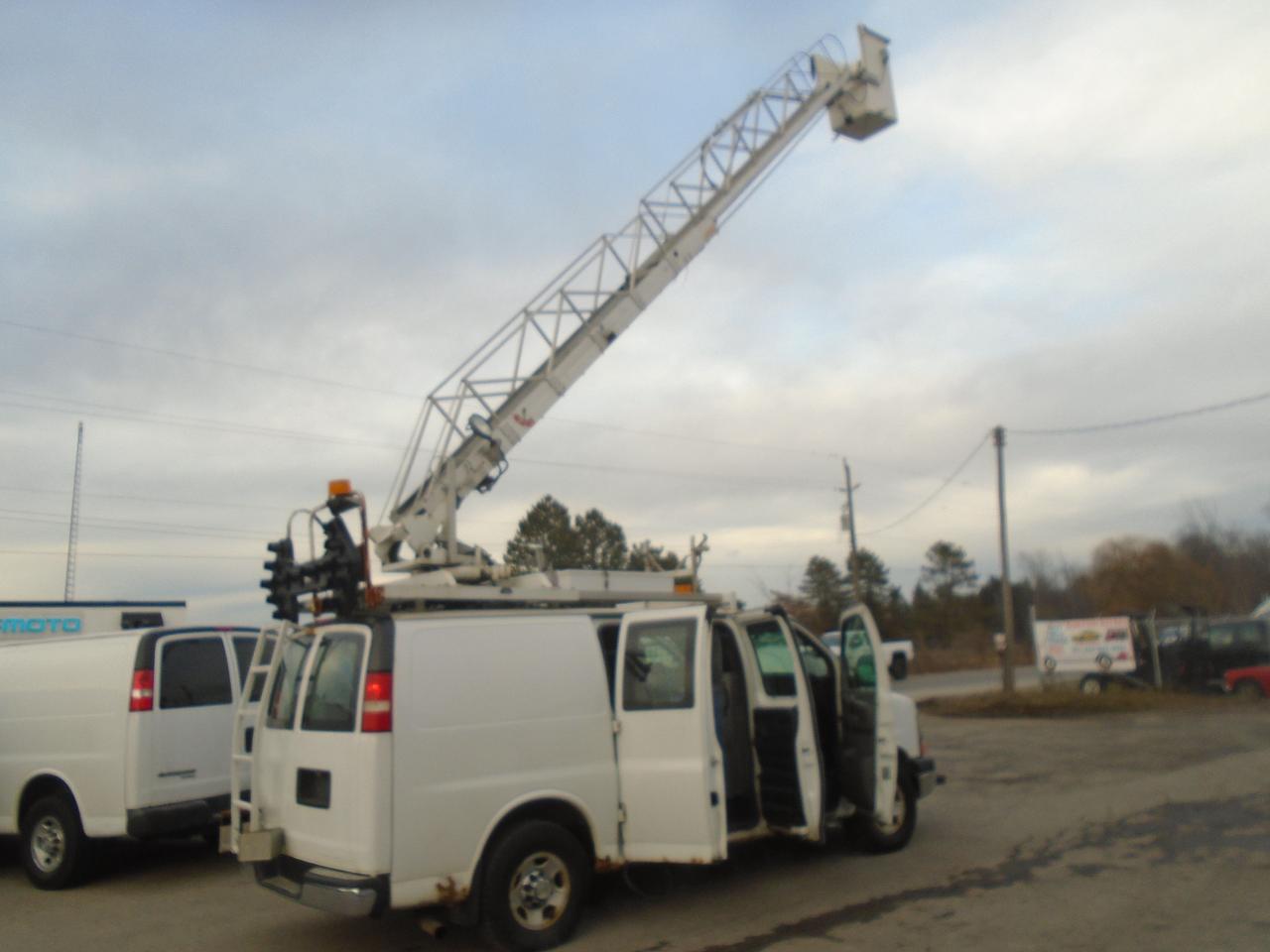 2011 Chevrolet Express Bucket Truck RWD 3500 35 Feet High Photo