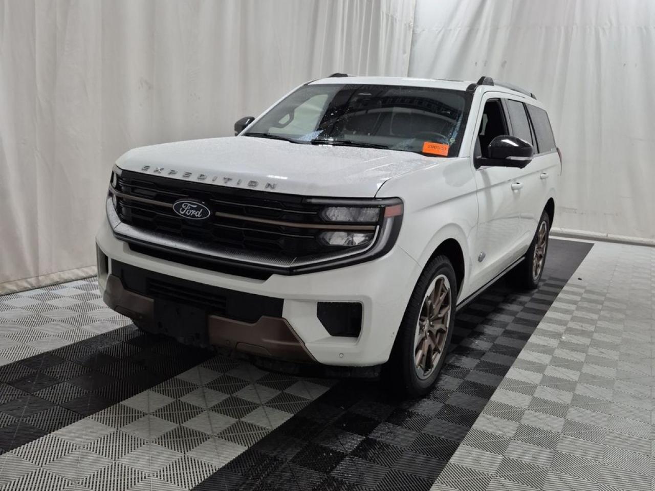 THE PRICE YOU SEE, PLUS GST. GUARANTEED!APPLE CARPLAY/ANDROID AUTO COMPATABLE! ***PREVIOUS FORD EXECUTIVE DRIVEN VEHICLE!******NEW PROGRAMS APPLY FOR LOW FINANCE/LEASE RATES***3.5 LITER ECOBOOST V6, 10 SPEED AUTO, KING RANCH TRIM(400a), MESA DEL RIO LEATHER SEATS, 7 PASSENGER SEATING, 2ND ROW CAPTAINS, 22 SINISTER BRONZE WHEELS, CO-PILOT 360 ACTIVE 2.0, PANORAMIC VISTA ROOF, FORD PASS CONNECT, TERRAIN MANAGEMENT  SYST.       The 2025 Ford Expedition King Ranch with the 400A package offers a blend of luxury, capability, and modern technology, making it a standout full-size SUV. Equipped with the powerful 3.5-liter EcoBoost V6 engine, it delivers robust performance with impressive horsepower and torque, ensuring ample towing and off-road capability. The 400A package enhances the vehicles luxury features, including premium interior materials, advanced infotainment systems, and driver-assistance technologies for a more comfortable and connected driving experience. One of the most striking visual upgrades is the set of 22-inch Sinister Bronze wheels, which add a bold, aggressive aesthetic to the Expeditions commanding presence. These larger wheels not only elevate the vehicles style but also contribute to improved handling and road stability. Overall, the 2025 Ford Expedition King Ranch with these specifications embodies a perfect combination of ruggedness and refinement, appealing to those seeking a versatile, stylish, and high-performance SUV.Do you want to know more about this vehicle, CALL, CLICK OR COME ON IN!*AMVIC Licensed Dealer; CarFax and Full Mechanical Inspection Included.