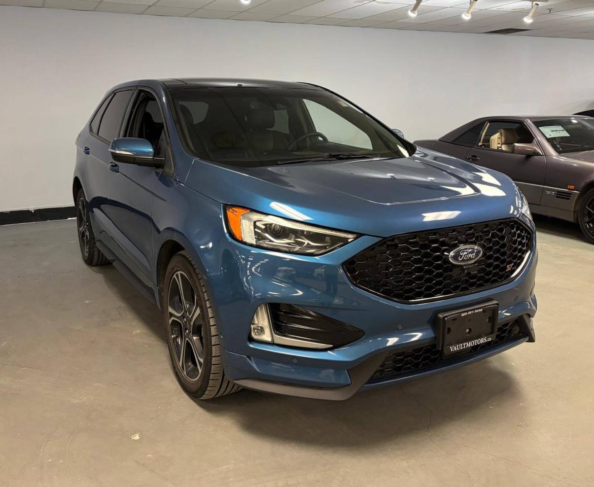 <p>2019 Ford Edge ST AWD&nbsp;</p><p><span>Drive home in the car youve been waiting for with<span>&nbsp;</span></span><strong>$0 Down On Approved Credit</strong><span><span>&nbsp;</span>(OAC)</span><span>! At our dealership, we make it easier than ever to get behind the wheel of a reliable, stylish vehicle without the big upfront cost. Whether youre upgrading, buying your first car, or treating yourself to something new, were here to help you get approved and rolling today. Dont waityour next ride is ready when you are!</span></p><p>Features: Transmission: 8-speed automatic with Sport mode and paddle shifters,&nbsp;Heated/cooled sport seats with ST badging,&nbsp;Cargo & Seating: Seats 5 passengers, cargo space similar to other Edge trims.,&nbsp;Drivetrain: Standard AWD with intelligent torque distribution ,&nbsp;Apple CarPlay and Android Auto Compatibility&nbsp;,&nbsp;SYNC&nbsp;3 Infotainment System with an 8.0 touchscreen , Blind Spot Information System and LOTS MORE!&nbsp;<span id=jodit-selection_marker_1767820480129_9971899803971377 data-jodit-selection_marker=start style=line-height: 0; display: none;></span></p> <p>BAD CREDIT, NO CREDIT NOT A PROBLEM. APPLY TODAY ON OUR WEBSITE WWW.VAULTMOTORS.CA OR COME VISIT OUR DEALERSHIP! &nbsp;</p><p> <br></p><p>WE WORK WITH ALL MAJOR BANKS TO GET YOU APPROVED!&nbsp;DEPENDS ON YOUR CREDIT HISTORY. CONTACT US TODAY AND LET OUR FAMILY SHOW YOU THE DIFFERENCE. Prices are plus HST & Licensing.&nbsp;<span id=jodit-selection_marker_1686168059819_6514763025256252 data-jodit-selection_marker=start style=line-height: 0; display: none;></span> </p><p><br></p><p>Please check our website www.vaultmotors.ca&nbsp; Please verify any information in question with our sales associates.</p><p> <br></p><p>All vehicles can be certified and E-tested for an additional fee from $895, depending on the make and model. If not Certified and E-tested, as per OMVIC Regulations, the vehicle is deemed to be not drivable, not E-tested, and Not Certified.&nbsp;&nbsp;</p><p> <br></p><p>-PROFESSIONALLY CLEANED INSIDE AND OUT -CAR PROOF HISTORY REPORT PROVIDED WITH EACH VEHICLE &nbsp; Trade-ins - We take any year and model! Bring in your old vehicle for a free appraisal. &nbsp;</p><p><br></p><p>#TeamVault #FamilyCars #SportsCars&nbsp;#Honda #Toyota #Hyundai #Nissan #BMW #Mercedes #Volkswagen #Porsche #Acura #Mississauga #Toronto #Showroom</p><p><br></p><p>BUY WITH CONFIDENCE!</p><p> &nbsp; <br></p><p>We are OMVIC registered and a member of Used Car Dealer Association</p><p>. &nbsp; &nbsp;&nbsp; VAULT MOTORS&nbsp; DRIVE IN PERFECTION &nbsp; </p><p>www.vaultmotors.ca </p><p><br></p><p>1650 Dundas Street East Mississauga ON L4X 2Z3&nbsp; </p><p>&nbsp;<br></p><p> Telephone 905-281-3030 </p><p><br></p><p>Monday to Saturday: 10:00AM TO 8:00PM</p><p> Sunday Appointment</p>