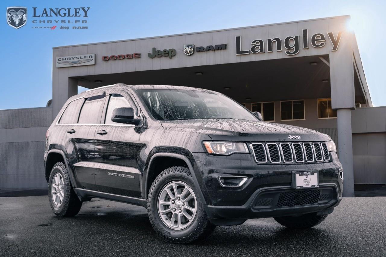 <p><strong>2018 JEEP GRAND CHEROKEE LAREDO 4X4</strong></p><p>A sophisticated and capable mid-size SUV that pairs refined on-road manners with Jeeps legendary go-anywhere confidence.</p><ul><li><p><strong>Engine</strong>: 3.6L Pentastar V6 with Engine Stop/Start</p></li><li><p><strong>Horsepower</strong>: 295 hp</p></li><li><p><strong>Torque</strong>: 260 lb-ft</p></li><li><p><strong>Max Towing</strong>: Up to 6,200 lbs (when properly equipped)</p></li><li><p><strong>Drivetrain</strong>: Quadra-Trac I 4x4 System</p></li></ul><p>Come book a test drive at Langley Chrysler, conveniently located in Langley, British Columbia.</p>

<p>*All prices plus applicable taxes, applicable environmental recovery charges, documentation of $599 and full tank of fuel surcharge of $76 if a full tank is chosen. <br />Other protection items available that are not included in the above price:<br />Tire & Rim Protection and Key fob insurance starting from $599<br />Service contracts (extended warranties) for coverage up to 7 years and 200,000 kms starting from $599<br />Custom vehicle accessory packages, mudflaps and deflectors, tire and rim packages, lift kits, exhaust kits and tonneau covers, canopies and much more that can be added to your payment at time of purchase<br />Undercoating, rust modules, and full protection packages starting from $199<br />Financing Fee of $500 when applicable<br />Flexible life, disability and critical illness insurances to protect portions of or the entire length of vehicle loan</p>