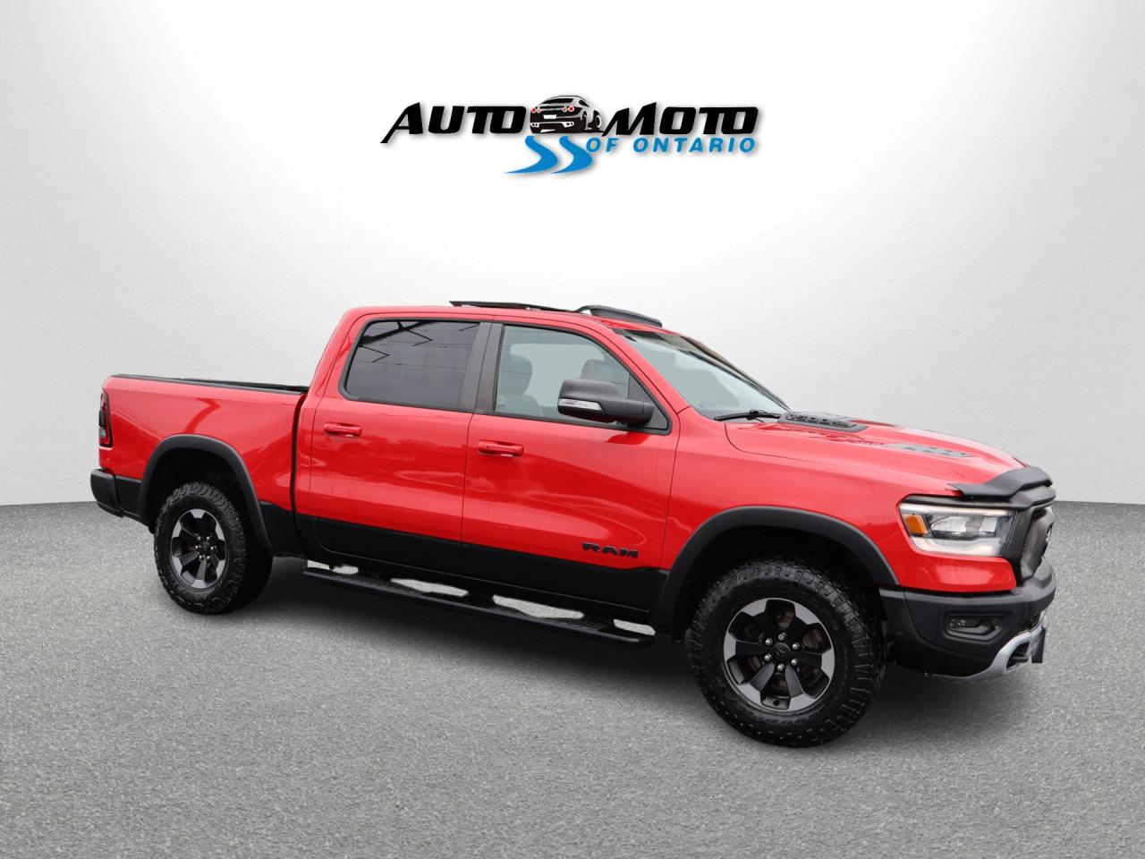 2019 RAM 1500 REBEL HEMI 4WD CERTIFIED *1 OWNER*ACCIDENT FREE* CAMERA NAV BLUETOOTH LEATHER HEATED SEATS SUNROOF CRUISE ALLOYS Photo