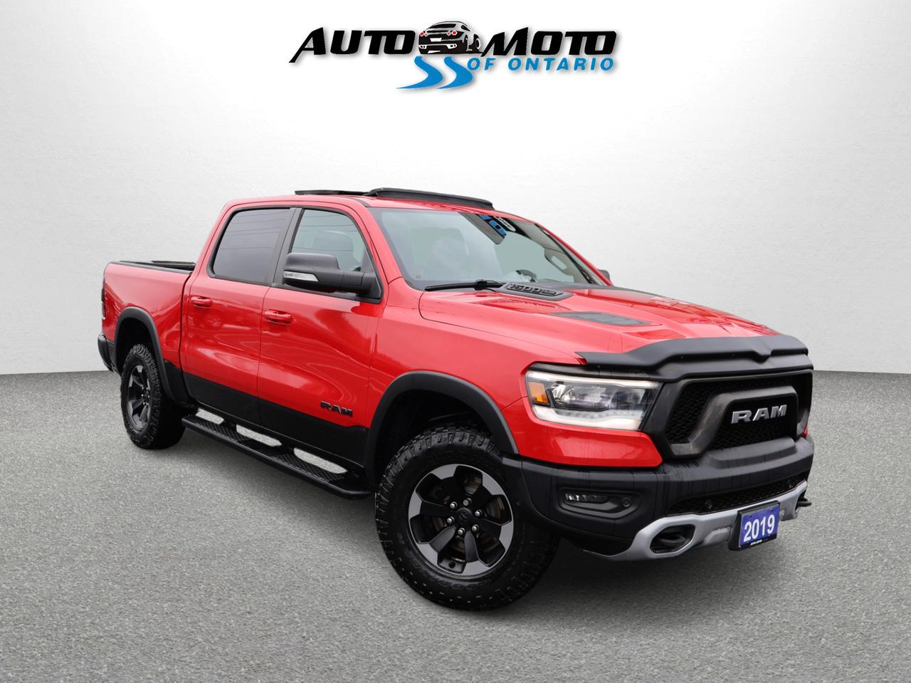 2019 RAM 1500 REBEL HEMI 4WD CERTIFIED *1 OWNER*ACCIDENT FREE* CAMERA NAV BLUETOOTH LEATHER HEATED SEATS SUNROOF CRUISE ALLOYS Photo