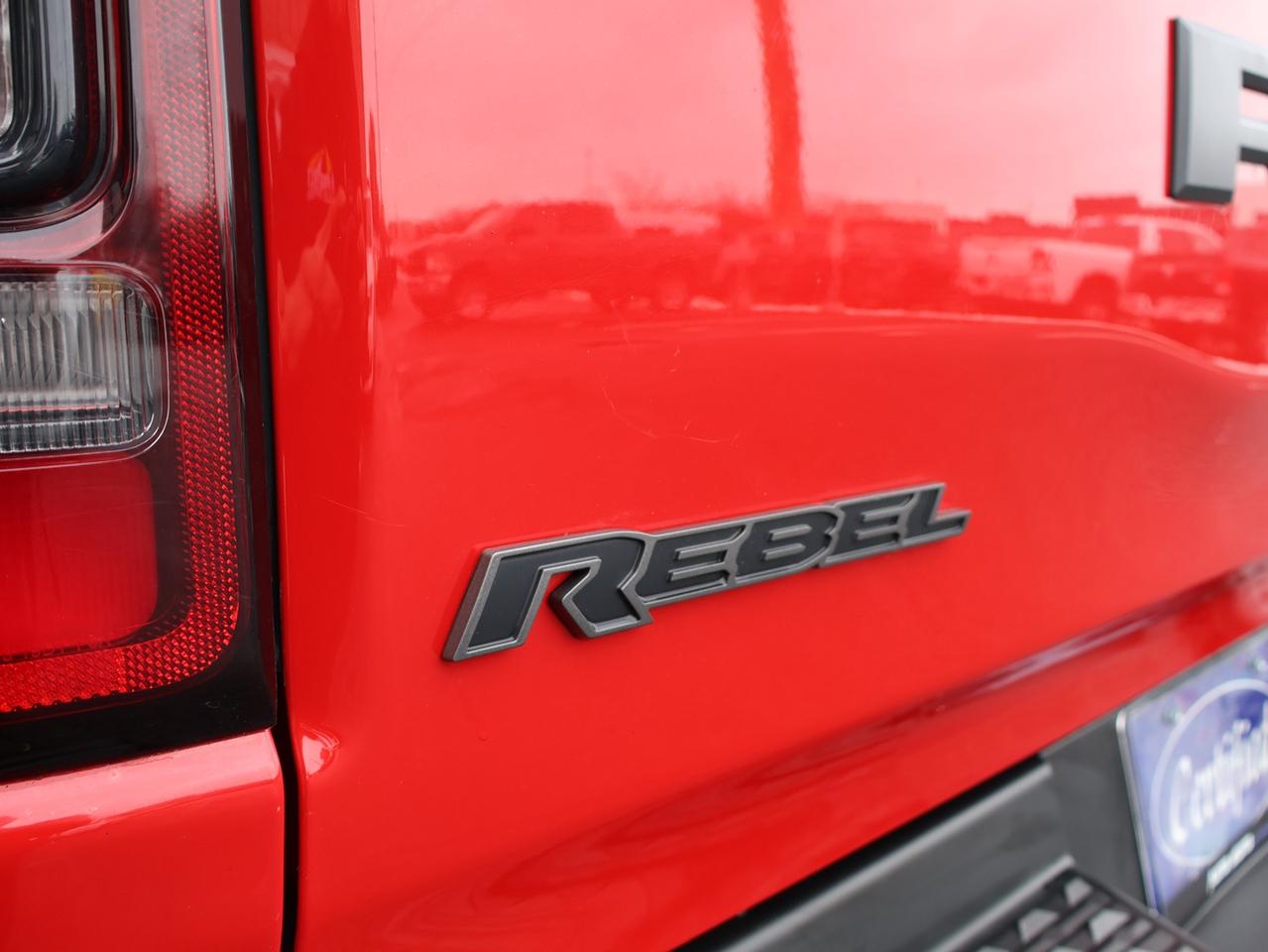 2019 RAM 1500 REBEL HEMI 4WD CERTIFIED *1 OWNER*ACCIDENT FREE* CAMERA NAV BLUETOOTH LEATHER HEATED SEATS SUNROOF CRUISE ALLOYS Photo