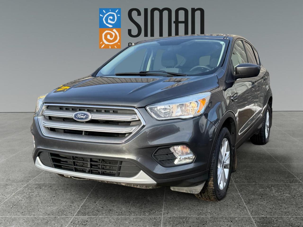<p>The 2017<strong>Ford Escape SE</strong>is a versatile and stylish compact SUV designed to handle everything from daily Regina commutes to weekend adventures across the prairies.</p>

<p>The Perfect Balance of Power and Utility</p>

<p>The 2017 model year brought a significant refresh to the Escape, introducing a more rugged exterior design and upgraded technology.</p>

<ul>
 <li><strong>Intelligent Performance:</strong>Powered by a<strong>1.5L EcoBoost engine</strong>, this SUV balances fuel efficiency with 179 horsepower and 177 lb-ft of torque.</li>
 <li><strong>Ready for Saskatchewan Winters:</strong>Equipped with an advanced<strong>Four-Wheel Drive (4WD)</strong>system and a<strong>Windshield Wiper De-icer</strong>, the Escape instills confidence during icy winter drives.</li>
 <li><strong>Smart Technology:</strong>Stay connected with the<strong>SYNC 3</strong>infotainment system, featuring an 8-inch touchscreen with<strong>Apple CarPlay</strong>and<strong>Android Auto</strong>integration.</li>
 <li><strong>Convenience & Comfort:</strong>Enjoy luxuries like<strong>heated front seats</strong>, a power drivers seat, and<strong>dual-zone automatic climate control</strong>. The rear seats fold flat to provide up to<strong>1,926 litres</strong>of cargo space for all your gear.</li>
</ul>

<p>Why Choose Siman Auto Sales?</p>

<p>For over<strong>25 years</strong>, Siman Auto Sales has been a trusted part of the Regina community. We pride ourselves on providing a no-pressure experience with the security you need:</p>

<ul>
 <li><strong>On-Site Financing Available:</strong>We offer flexible, on-site financing for all credit situations through 6 chartered banks and 12 different lenders, including<strong>guaranteed approval</strong>options.</li>
 <li><strong>Aftermarket Warranty Included:</strong>Every vehicle we sell comes with an<strong>aftermarket warranty</strong>to protect your investment and provide total peace of mind.</li>
 <li><strong>Hassle-Free Trades:</strong>We welcome all trade-ins and work to get you the best possible value for your current vehicle.</li>
 <li><strong>Certified Quality:</strong>Every vehicle undergoes a journeyman-supervised mechanical inspection to ensure its ready for the road.</li>
</ul>

<p>Experience the capability of the 2017<strong>Ford Escape SE</strong>today. Visit<strong>Siman Auto Sales</strong>at<strong>1810 2nd Avenue North</strong>in Regina or browse our full inventory on the<a href=https://www.simanautosales.com/ target=_blank>Siman Auto Sales website</a>.</p>