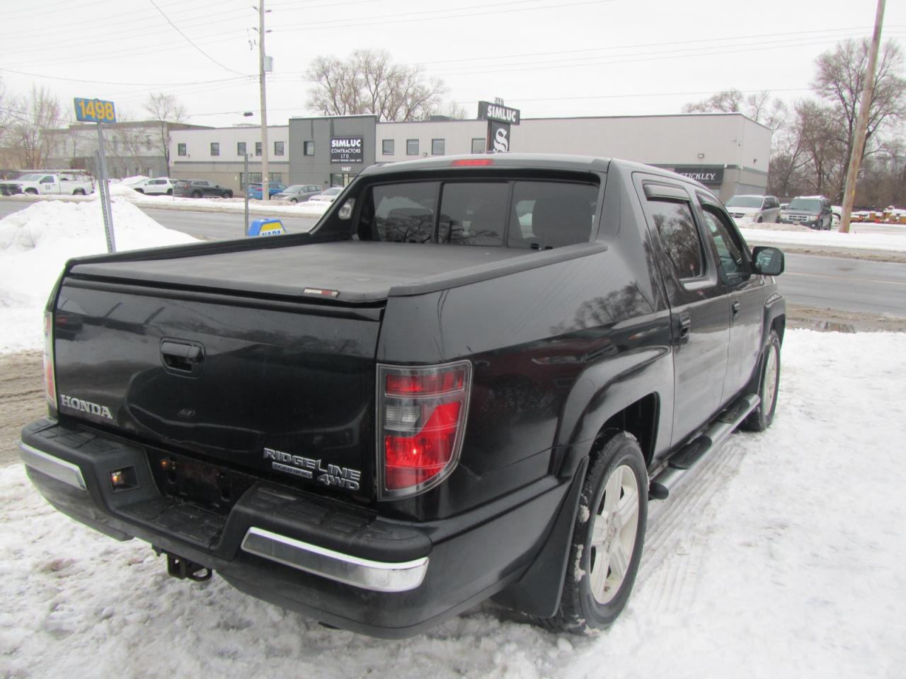 2014 Honda Ridgeline 4WD Crew Cab RTL Photo