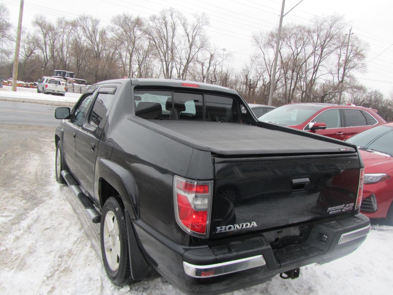 2014 Honda Ridgeline 4WD Crew Cab RTL Photo