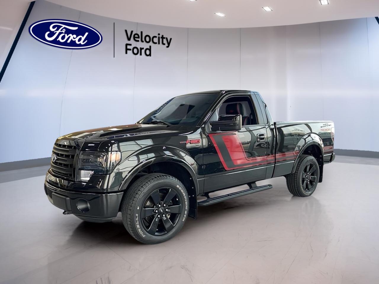 // LOW KILOMETRES //  
// LOCATED IN MOOSE JAW //  
// EXCELLENT CONDITION //  

Discover the reliability and capability of the 2014 Ford F-150, now available at Velocity Ford in Moose Jaw. This used truck stands out with its bold black exterior and efficient 3.5L V6 DOHC engine. With only 37,512 km on the odometer, it delivers both power and longevity for your driving needs.

TRUCK FEATURES  
»» Towing capacity ideal for work or recreation  
»» Durable bed for heavy-duty hauling  
»» 6-speed automatic transmission for smooth shifting  
»» Rear-wheel drive for stable performance  

ADVANCED SAFETY FEATURES  
»» Front and side airbags for added protection  
»» Four-wheel anti-lock brakes for secure stops  
»» Electronic stability control for confident handling  
»» Tire pressure monitoring system for safety assurance  

PERFORMANCE AND EFFICIENCY  
»» 3.5L V6 engine for balanced power  
»» 6-speed automatic transmission for efficient driving  
»» Fuel-efficient for its class and size  
»» Responsive acceleration for highway merging  

COMFORT AND CONVENIENCE  
»» Spacious cabin with ample legroom  
»» Air conditioning for year-round comfort  
»» Power windows and door locks  
»» Adjustable steering column for personalized fit  

TECHNOLOGY AND CONNECTIVITY  
»» AM/FM stereo for entertainment  
»» Auxiliary input for music devices  
»» Easy-to-read dashboard display  
»» Power outlets for charging devices  

CARGO SPACE  
»» Large truck bed for versatile cargo  
»» Multiple tie-down points for securing loads  
»» Wide-opening tailgate for easy access  
»» Roomy interior storage compartments  

WHAT OTHER OWNERS LIKE  
»» Reliable performance in all weather conditions  
»» Comfortable ride for long trips  
»» User-friendly controls and features  
»» Impressive towing and hauling capability  

This 2014 Ford F-150s VIN is: 1FTMF1ET3EFB04513.