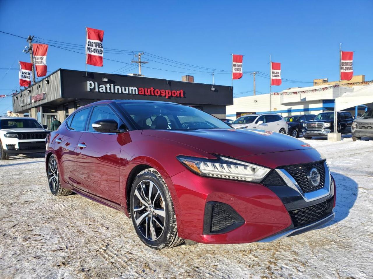 2021 Nissan Maxima SL   Sport Luxury Sedan for Sale in Saskatoon, SK
**FACTORY COMMAND START
**HEATED PREMIUM LEATHER SEATS
**REAR CLIMATE CONTROL AND REAR HEATED SEATS
**BOSE SOUND SYTEM
**Apple CarPlay® & Android Auto
VIN: 1N4AA6DVXMC512806
Mileage: 139,940 KM
Exterior Color: Carnelian Red Metallic
Interior: Black Leather
Condition: Fully Loaded | Excellent Condition

Sporty Performance Meets Premium Comfort

Now available at Platinum Auto Sport, this 2021 Nissan Maxima SL delivers the perfect balance of performance, luxury, and advanced technology. Finished in eye-catching Carnelian Red Metallic with a refined black leather interior, the Maxima is Nissans flagship sedan known for its powerful V6 engine, smooth ride, and upscale features.

Ideal for commuting, highway driving, or anyone who wants sporty performance without sacrificing comfort, this Maxima SL is built for Saskatchewan roads.

P Key Features of the 2021 Nissan Maxima SL
Performance & Handling

3.5L V6 Engine

Xtronic CVT® Automatic Transmission

Front-Wheel Drive (FWD)

Paddle Shifters

Sport-Tuned Suspension

Strong acceleration with smooth power delivery

Exterior Features

Carnelian Red Metallic Paint

LED Headlights & LED Daytime Running Lights

LED Taillights

18-Inch Alloy Wheels

Chrome Exterior Accents

Heated Power Side Mirrors

Dual Exhaust Tips

Luxury Interior & Comfort

Premium Black Leather Seating

Heated Front Seats

Power Adjustable Front Seats with Memory

Heated Steering Wheel

Dual-Zone Automatic Climate Control

Leather-Wrapped Steering Wheel

Spacious Seating for Five

60/40 Split-Folding Rear Seats

Technology & Infotainment

NissanConnect® Touchscreen Infotainment System

Integrated Navigation

Apple CarPlay® & Android Auto

Bose® Premium Audio System

Bluetooth® Hands-Free Calling & Audio Streaming

Push-Button Start & Intelligent Key

Remote Start

Multiple USB Charging Ports

Safety & Driver Assistance (Nissan Safety Shield® 360)

Adaptive Cruise Control

Blind Spot Warning

Rear Cross Traffic Alert

Forward Collision Warning

Automatic Emergency Braking

Lane Departure Warning

Rearview Backup Camera

Front & Rear Parking Sensors

Traction Control & Stability Control
/  Why Buy This 2021 Nissan Maxima SL?
/  Powerful V6 Performance/  Premium Leather Interior/  Advanced Safety Technology
  Sporty Yet Comfortable Ride
  Excellent Value Luxury Sedan
+P Why Buy from Platinum Auto Sport?

At Platinum Auto Sport, we proudly offer in-house financing for ALL credit types, including:
/  Good credit
  Bad credit/  No credit/  Self-employed/  Rebuilding credit/  New to Canada

We serve customers throughout Saskatoon, Regina, Prince Albert, Moose Jaw, North Battleford, and all of Saskatchewan, making approvals fast and stress-free.

 Book Your Test Drive Today

This 2021 Nissan Maxima SL combines luxury, performance, and reliability in one sleek package and its ready for the road.

 Visit Platinum Auto Sport in Saskatoon, SK
 Schedule your test drive today
 Apply now for in-house financing   all credit types welcome

Drive bold. Drive refined. Drive Platinum Auto Sport.