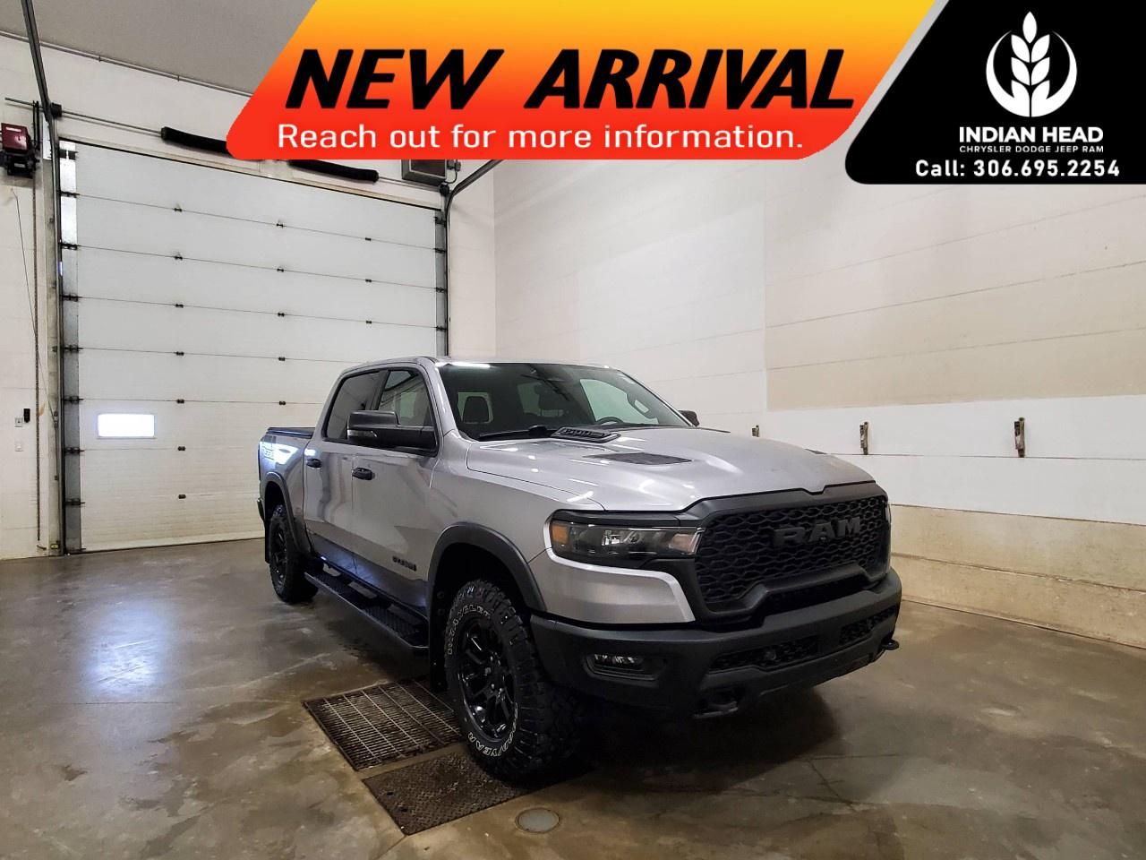 <p>The 2025 Ram 1500 Rebel, with its striking Silver hue and robust 4x4 drive train, offers exceptional handling for any adventure. This Truck is built with the discerning driver in mind, ensuring that every journey is as exhilarating as it is comfortable.</p><p>Step into a bold and vibrant Red interior that complements its rugged exterior. The Ram 1500 Rebel is equipped with stylish alloy wheels and a commanding presence on the road. Inside, you'll find thoughtful touches such as heated mirrors and a leather-wrapped heated steering wheel, creating an inviting cabin environment.</p><p>This vehicle is packed with modern technology and features like a backup camera, Bluetooth connection, and satellite radio, all accessible with ease. Safety is paramount with advanced systems such as brake assist, lane assist, and parking sensors, providing peace of mind on every drive. Enjoy the convenience of adaptive cruise control and remote start, ensuring you're always ready to go.</p><p>Perfect for adventurers and families alike, the 2025 Ram 1500 Rebel 4x4 Crew Cab 5'7" Box beckons those who love to combine toughness with technology. Contact us today for more information and see how this truck matches your lifestyle.</p>