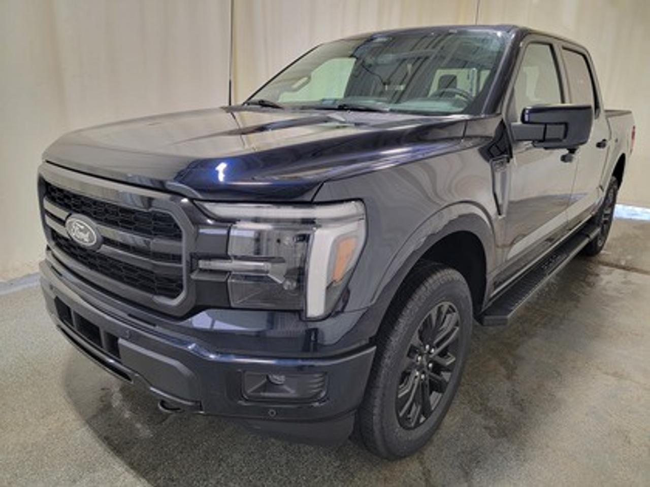 The all-new 2026 Ford F-150 Lariat 502A looks absolutely stunning in Antimatter Blue Metallic. This pickup comes with the 3.5L V6 EcoBoost engine. This remarkable engine not only produces 400 horsepower and 500 ft-lbs of torque, but by leveraging this advanced technology and a 10-speed automatic transmission, this truck is rated to get 12.3L/100km (23 miles per gallon) combined highway/city fuel economy. 

This vehicle comes with the All-Weather Packageready to take on any season!
Snow, rain, mud, or sunshinethis vehicle is built for it all! The All-Weather Package adds extra protection where it matters most, with premium mud flaps to shield your paint from road debris, all-weather floor mats to protect your interior from lifes messes, and Xpel paint protection to help guard against those infuriating rock chips. Drive with confidence, knowing your investment is protected from Regina's elements.

Key Features:
Ford Co-Pilot360 Assist 2.0
Adaptive Cruise Control
360-Degreee Camera
Lane Centering Assist
Evasive Steering Assist
Front Parking Sensors
14 Speaker B&O Sound System
Connected Navigation
Remote Start System
Universal Garage Door Opener
Heated Steering Wheel
Memory Driver Seat
Heated And Ventilated Front Seats
Heated Rear Seats
Black Appearance Package
Skid Plates
Twin Panel Moonroof
Retractable Rear Center Step

Saskatchewan has a challenging climate and driving conditions, but let that stress melt away with the 2026 F-150 Lariat, a tough truck that leverages physical features and technology to keep your family safe. This specific unit is loaded with features, including power windows, power locks, dual-zone electronic automatic temperature control, 10-way power drivers seat with memory, wrapped steering wheel, zone lighting, cruise control, dynamic brake support, outside temperature display, hill start assist, perimeter alarm system, four-wheel drive, and so much more.

Bennett Dunlop Ford, proudly serving Regina for over 40 years, is conveniently located at 770 Broad Street. With over 3,500 Google reviews, our reputation reflects our commitment to providing a fast, easy, and enjoyable vehicle-buying experience. We eliminate the hassle with no admin or documentation fees, transparent upfront pricing that lets you shop with total confidence. But were more than just a dealershipwere driven to make a difference by supporting local community initiatives and events that matter to you. Visit Bennett Dunlop Ford today and experience why were Reginas trusted choice for quality vehicles, exceptional service, and a genuine commitment to driving change in our community!