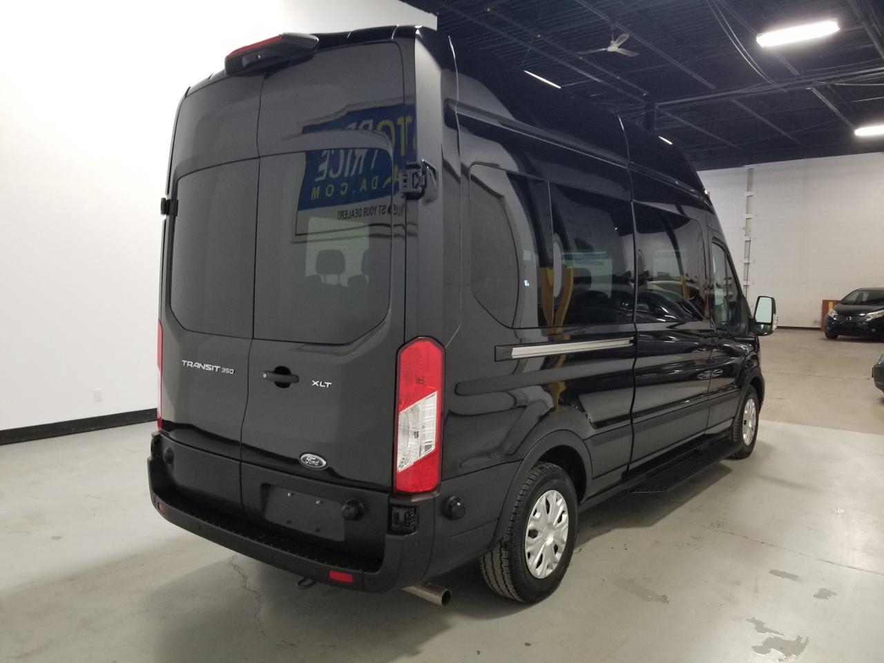 2024 Ford Transit-350 Passenger XLT Rear-Wheel Drive High Roof Van 148 in. WB Photo
