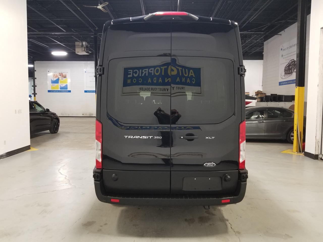 2024 Ford Transit-350 Passenger XLT Rear-Wheel Drive High Roof Van 148 in. WB Photo