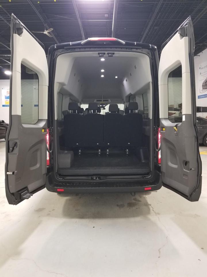 2024 Ford Transit-350 Passenger XLT Rear-Wheel Drive High Roof Van 148 in. WB Photo
