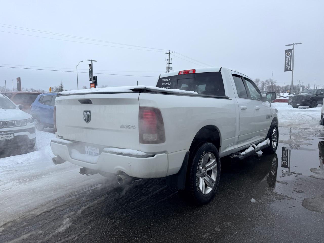 2017 RAM 1500 4WD Quad Cab 6.4 Ft Box Sport Photo3