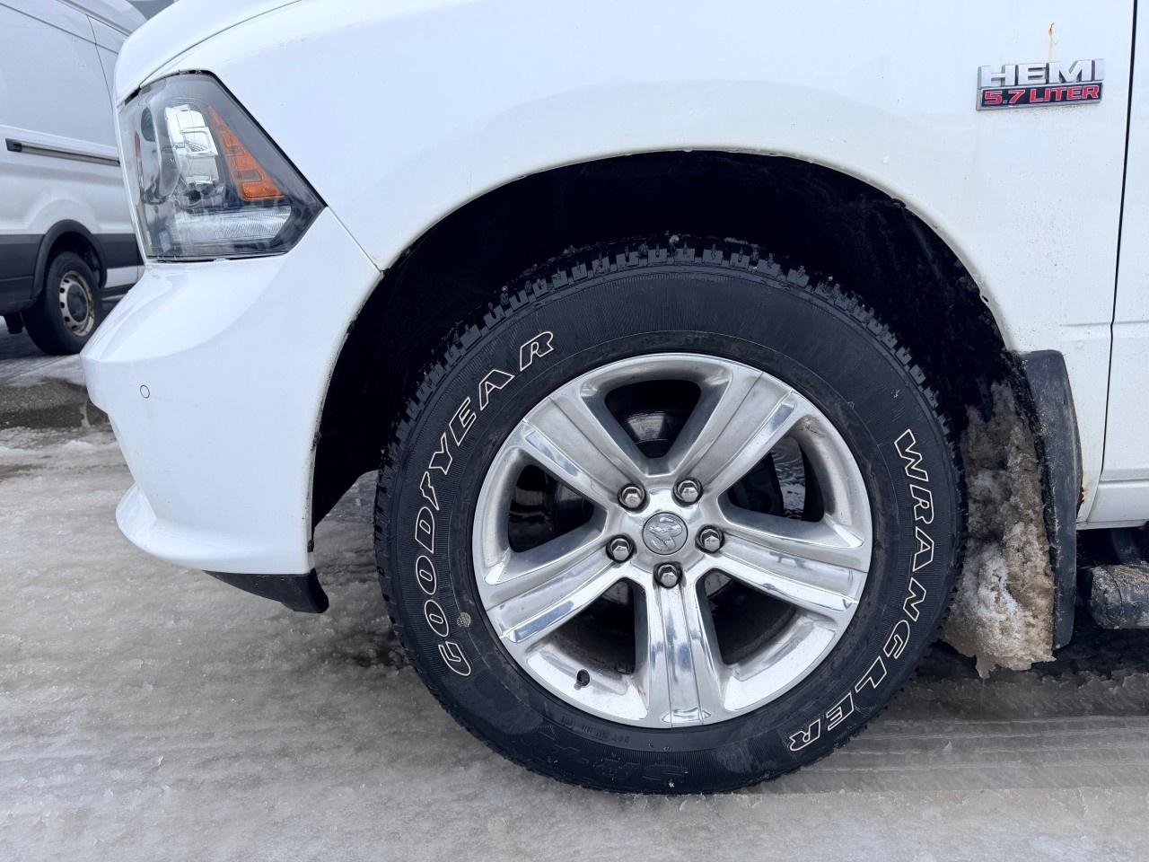 2017 RAM 1500 4WD Quad Cab 6.4 Ft Box Sport Photo