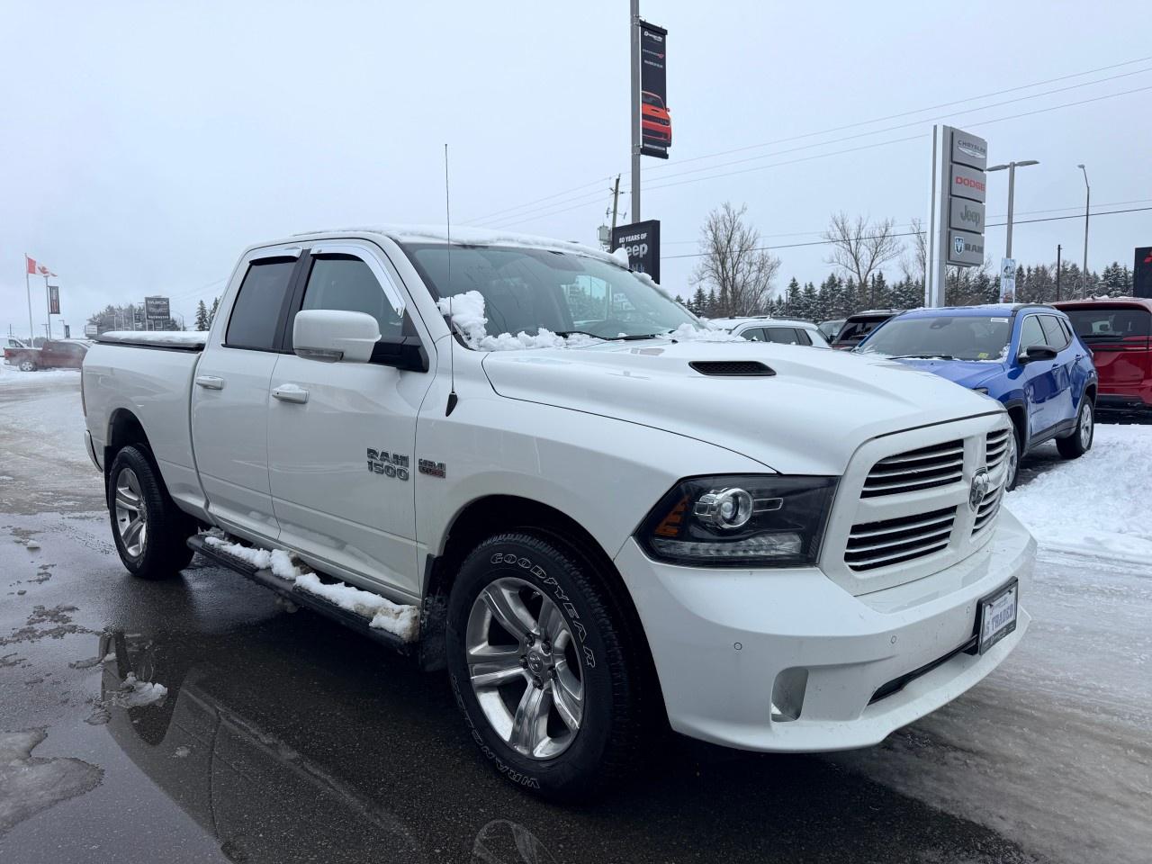 2017 RAM 1500 4WD Quad Cab 6.4 Ft Box Sport Photo
