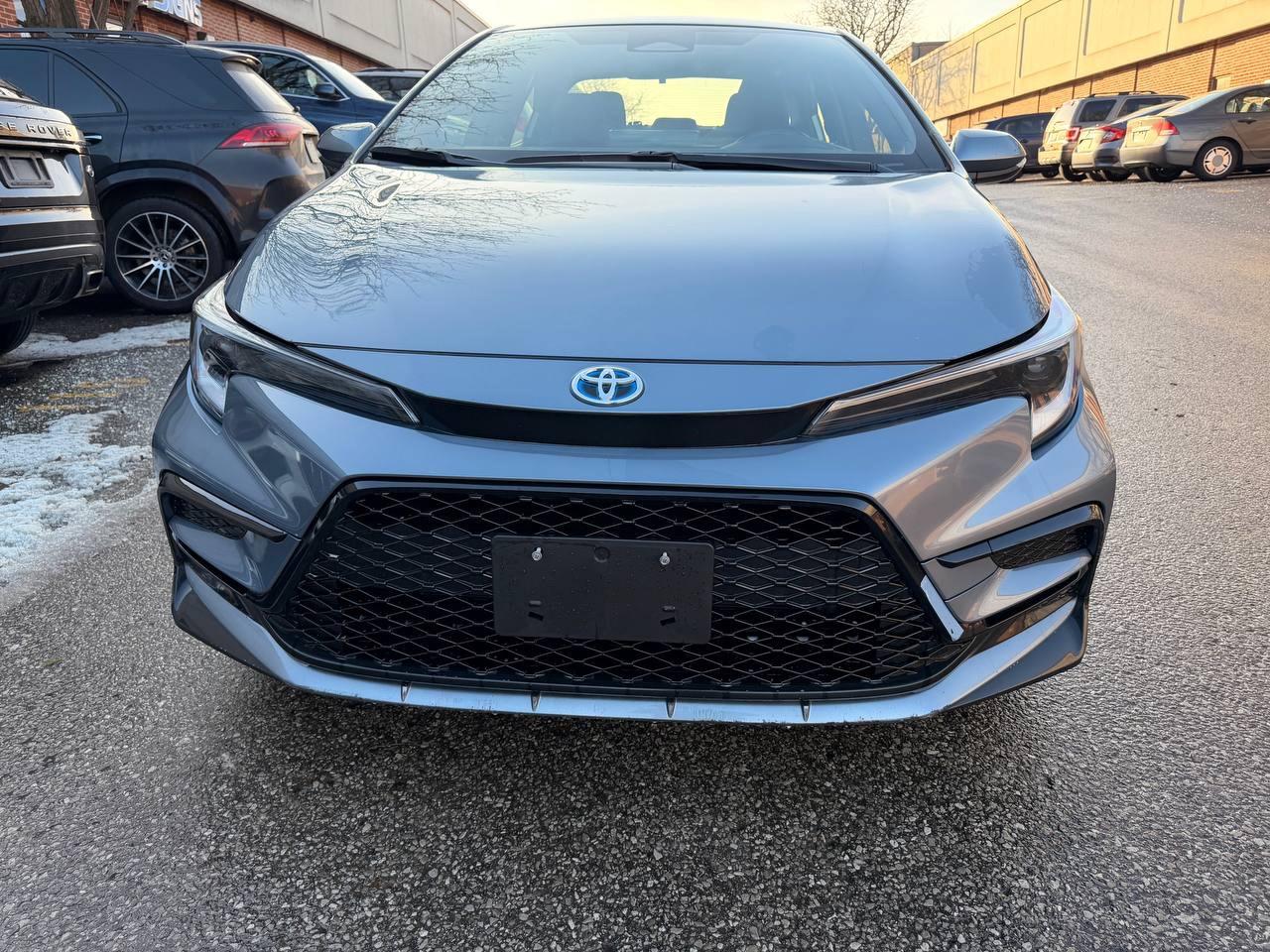 2024 Toyota Corolla Hybrid SE CVT AWD, SUNROOF, ALLOY WHEELS Photo