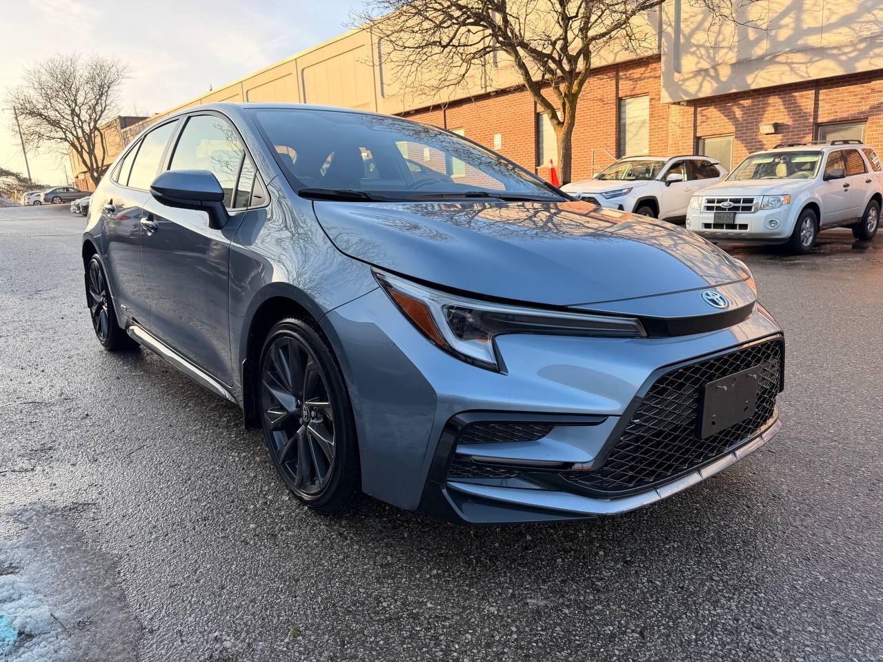 2024 Toyota Corolla Hybrid SE CVT AWD, SUNROOF, ALLOY WHEELS Photo