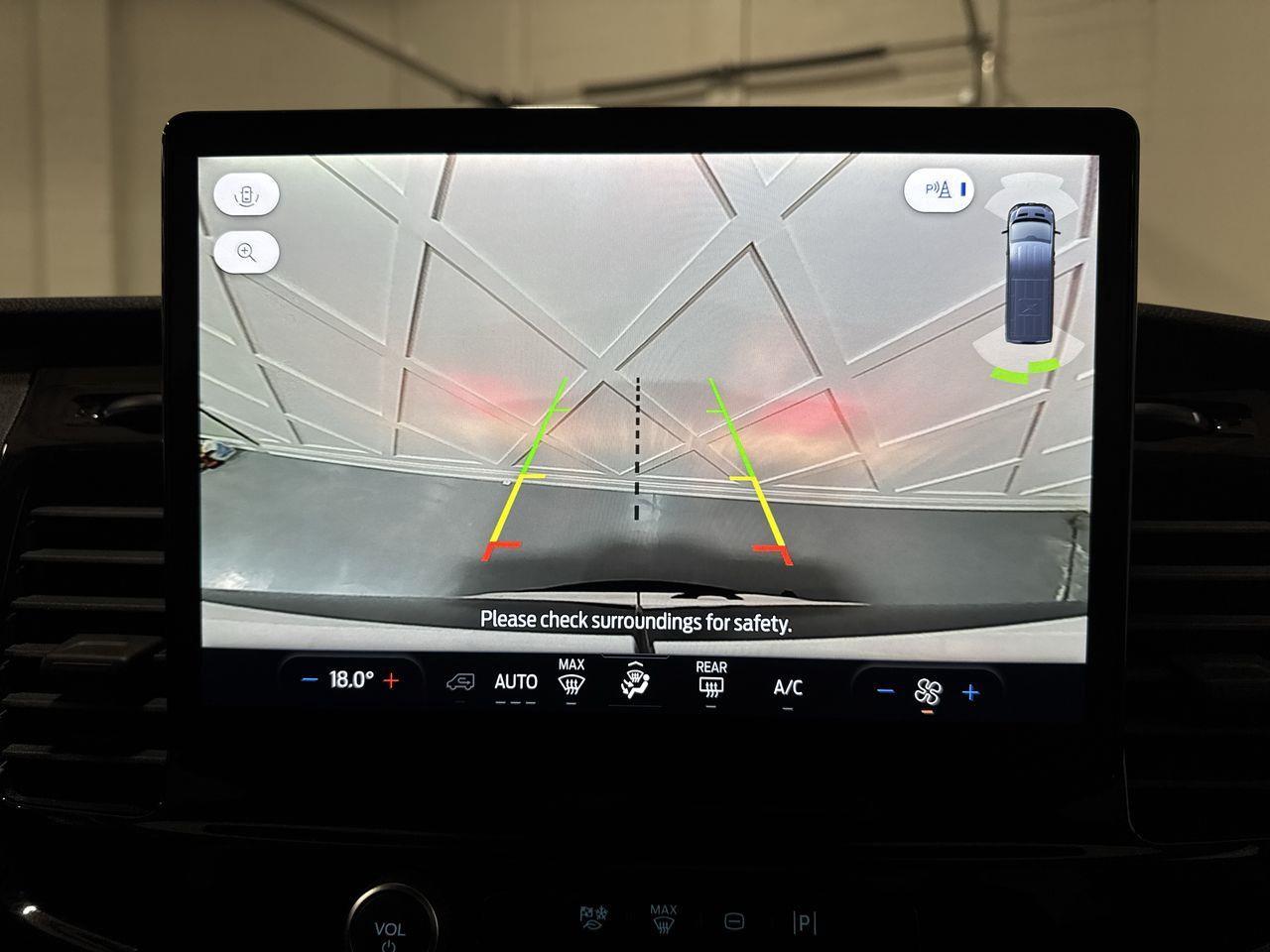 2024 Ford Transit-350 Passenger XLT Rear-Wheel Drive Medium Roof Van 148 in. WB Photo