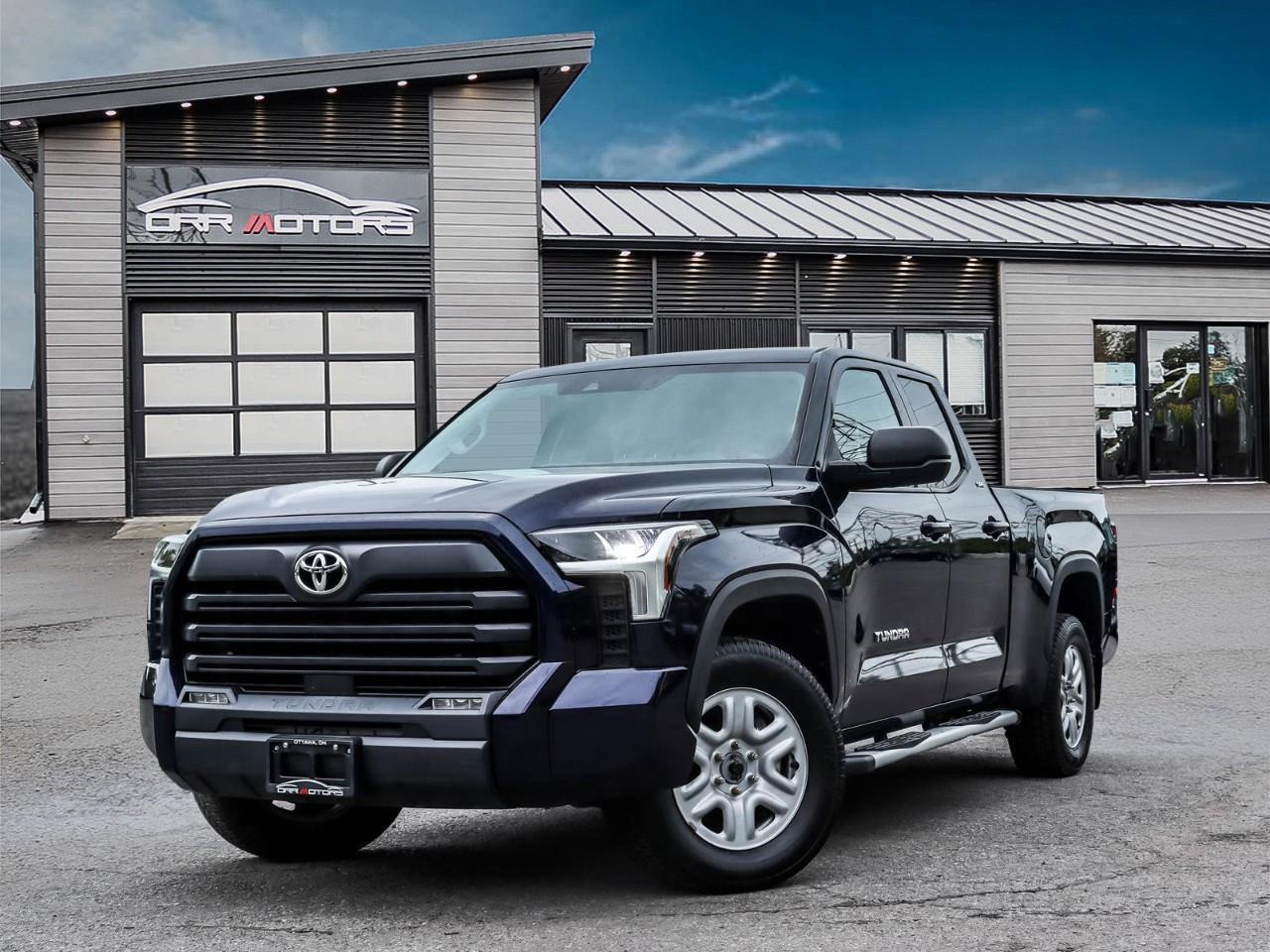 <p><strong>2023 Toyota Tundra SR5 Double Cab 4x4 – 3.5L Twin-Turbo V6 – Only 64,513 km – Powerful Work Truck in Excellent Condition</strong></p><p>Looking for a powerful, reliable, and well-equipped full-size pickup? Check out this <strong>2023 Toyota Tundra SR5 Double Cab 4x4</strong> with only <strong>64,513 km</strong>, available now at <strong>Orr Motors</strong> in Ottawa. This truck is ideal for towing, hauling, and daily driving, thanks to its robust <strong>3.5L twin-turbo V6</strong>, spacious <strong>Double Cab</strong>, and durable <strong>6.5-foot bed</strong>.</p><p><strong>Key Features:</strong></p><ul><li><p><strong>3.5L Twin-Turbo V6</strong> Engine – 389 hp and 479 lb-ft torque</p></li><li><p><strong>10-Speed Automatic Transmission</strong></p></li><li><p><strong>4x4 Drivetrain</strong> – Built for Canadian winters</p></li><li><p><strong>6.5-Foot Composite Bed</strong> with Tow Package and Integrated Brake Controller</p></li><li><p><strong>Double Cab</strong> with Room for Work Crew or Family</p></li><li><p><strong>Toyota Safety Sense 2.5</strong> – Pre-Collision System, Lane Keep Assist, Radar Cruise Control</p></li><li><p><strong>Blind Spot Monitor</strong> with Rear Cross-Traffic Alert</p></li><li><p><strong>Backup Camera</strong> with Dynamic Guidelines</p></li><li><p><strong>8” Touchscreen Display</strong> with Apple CarPlay & Android Auto</p></li><li><p><strong>Push-Button Start, Keyless Entry, Dual-Zone Climate Control</strong></p></li></ul><p><strong>Specs & Condition:</strong></p><ul><li><p><strong>Mileage:</strong> 64,513 km</p></li><li><p><strong>Drivetrain:</strong> 4x4</p></li><li><p><strong>Fuel Type:</strong> Gasoline</p></li><li><p><strong>Body Style:</strong> Double Cab Pickup</p></li><li><p><strong>Transmission:</strong> Automatic</p></li><li><p><strong>Condition:</strong> Excellent inside and out</p></li><li><p><strong>Location:</strong> Orr Motors, Ottawa ON – Dealer #613-836-3333</p></li></ul><p>This 2023 Toyota Tundra SR5 is a rare find – combining modern tech, Toyota dependability, and true truck utility. Perfect for contractors, business owners, outdoor enthusiasts, or anyone who wants serious capability without compromising comfort.</p><p><strong>Why Buy From Orr Motors?</strong></p><ul><li><p>Trusted Ottawa Dealership with Hundreds of 5-Star Reviews</p></li><li><p>All Vehicles CarFax Verified and Fully Inspected</p></li><li><p>Competitive Financing Available (OAC)</p></li><li><p>All Trades Welcome</p></li></ul><p><strong>Call 613-836-3333 or visit </strong><a target=_blank rel=nofollow noopener noreferrer href=http://www.orrmotors.com><strong>www.orrmotors.com</strong></a> to book your test drive today!</p><p>Orr Motors - The trusted used car dealer in Ottawa since 1962.</p> <br /> <br /> <br /> **Advertised price is for finance purchase. <br /> *Every reasonable effort is made to ensure the accuracy of the information listed above. Vehicle pricing, incentives, options (including standard equipment), and technical specifications listed is for the Year, Make and Model of the vehicle, and may not match the exact vehicle displayed. Please confirm with a sales representative the accuracy of this information.