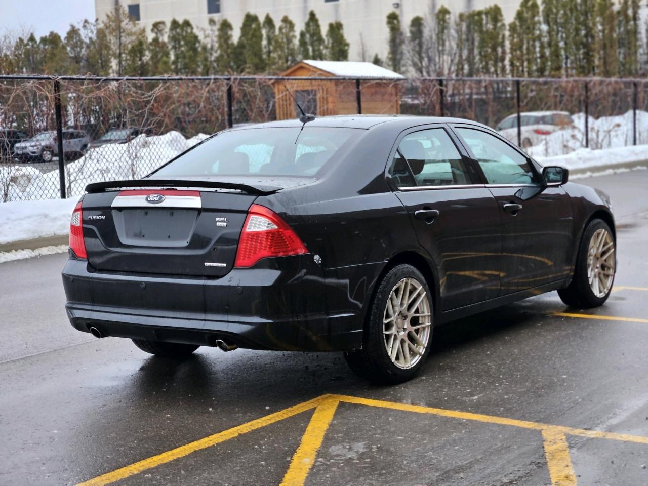 2012 Ford Fusion 4dr Sdn SEL AWD Photo