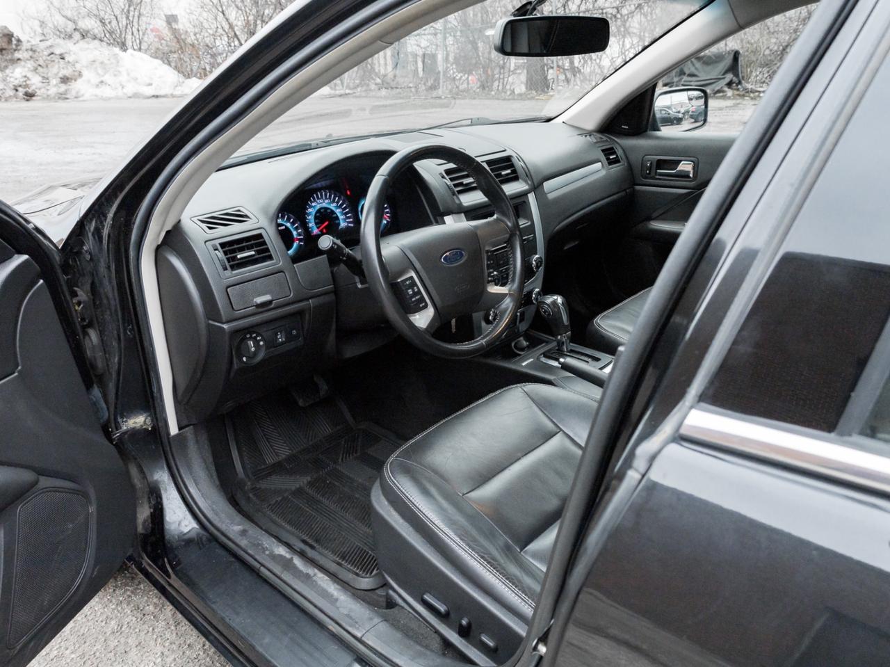 2012 Ford Fusion SEL AWD, LEATHER, SUNROOF Photo