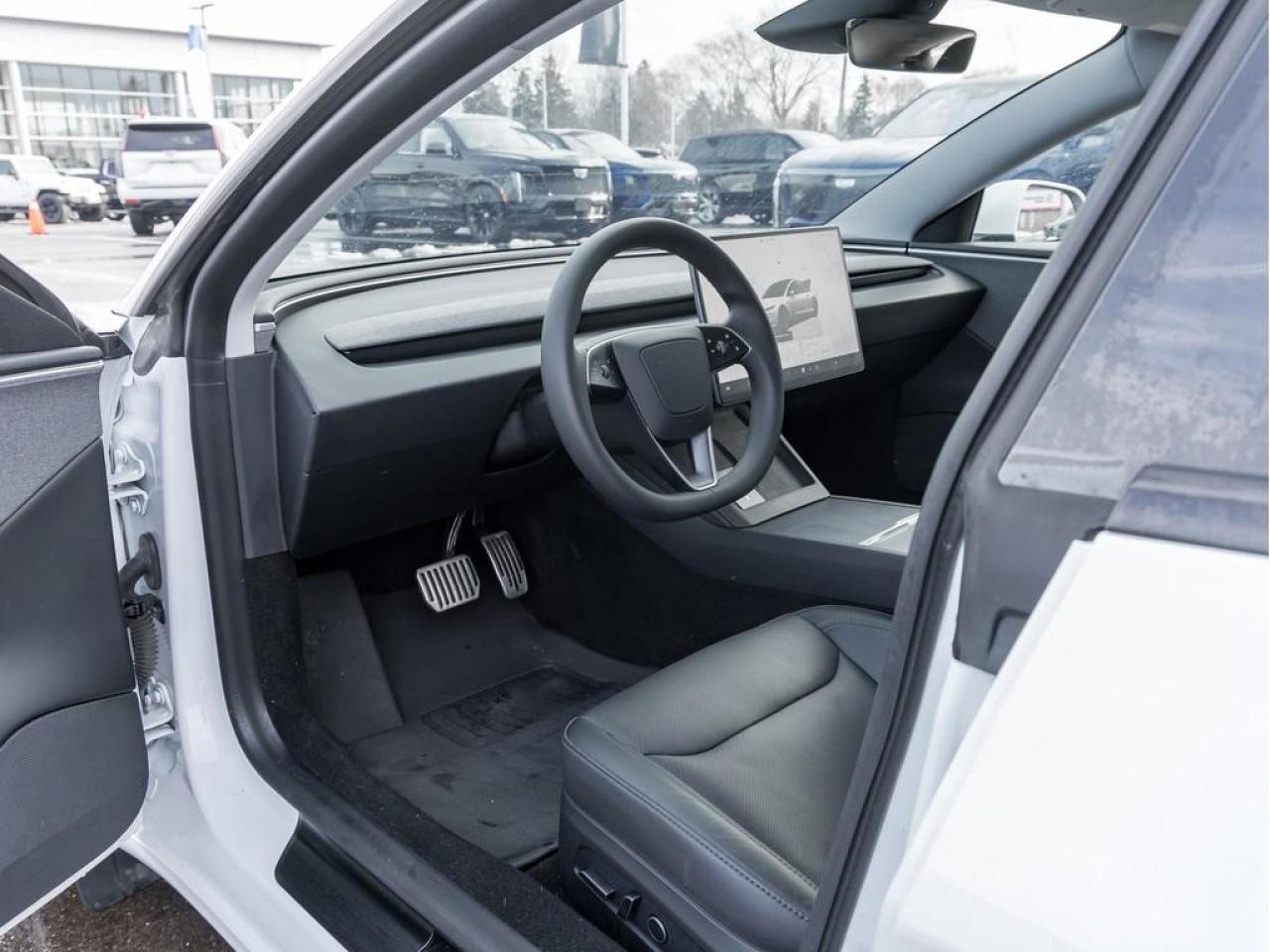 2024 Tesla Model 3 Base 4dr Rear-Wheel Drive Sedan Photo